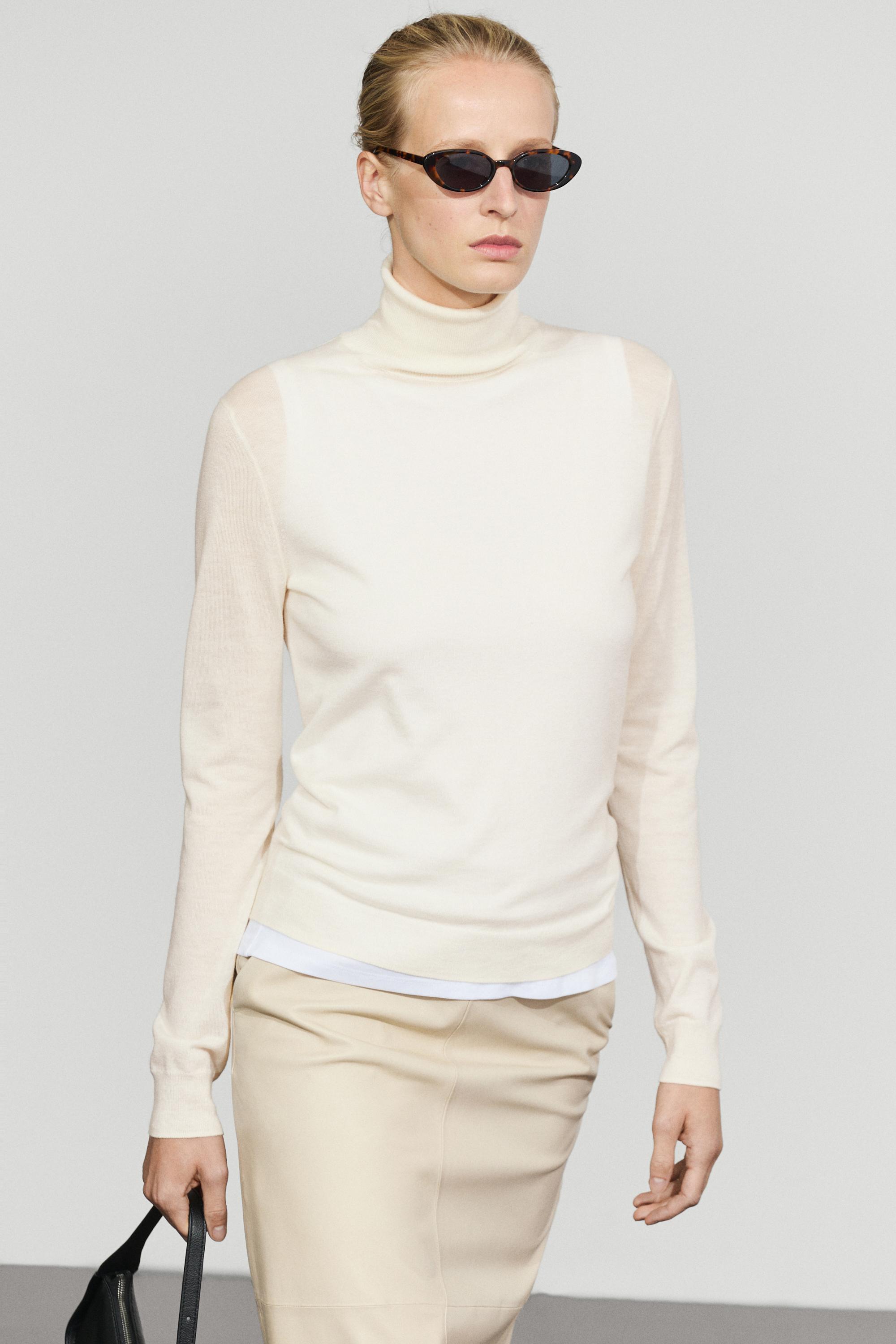 Wool-blend turtleneck knit sweater