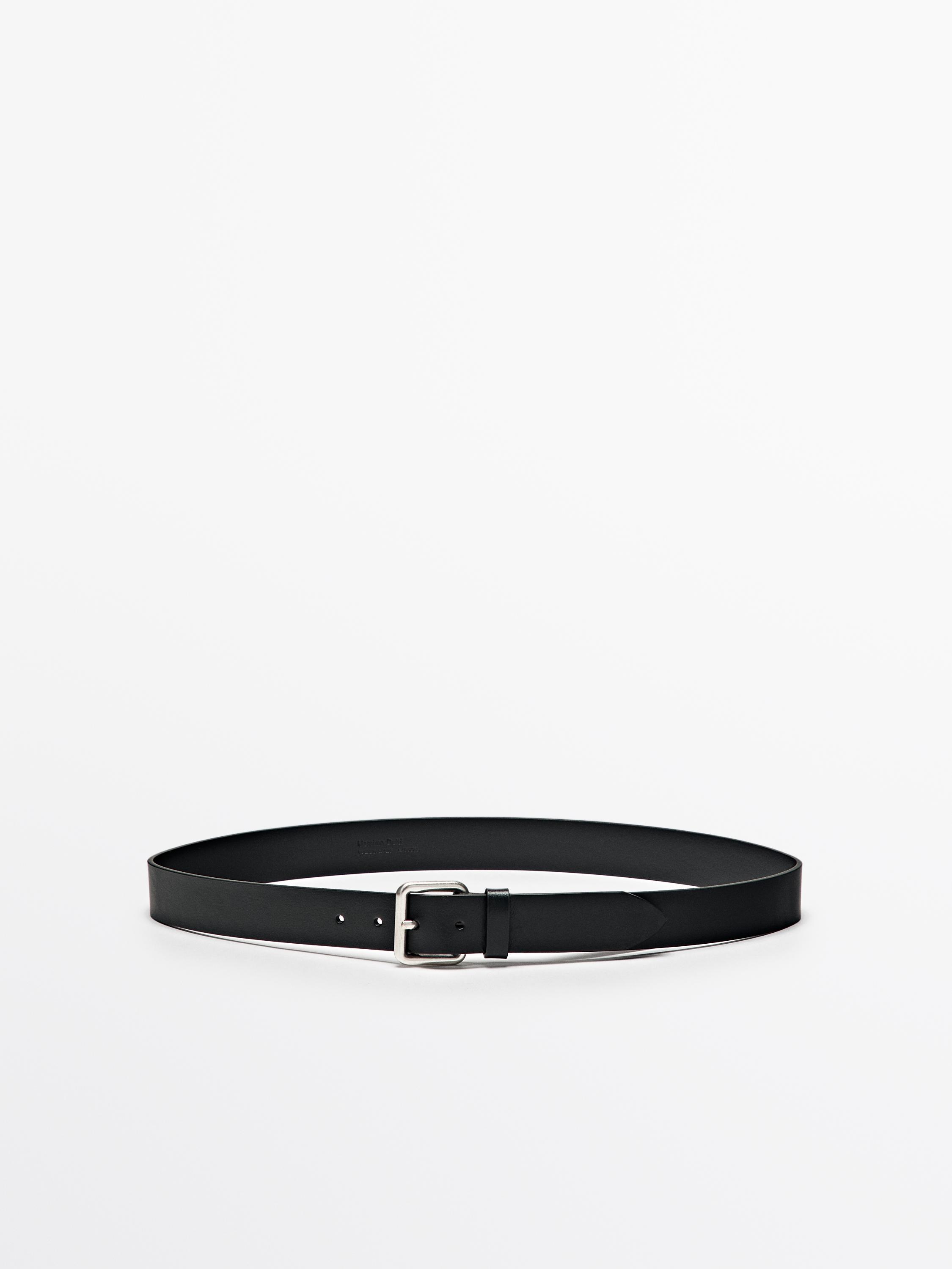 Leather belt with metallic buckle