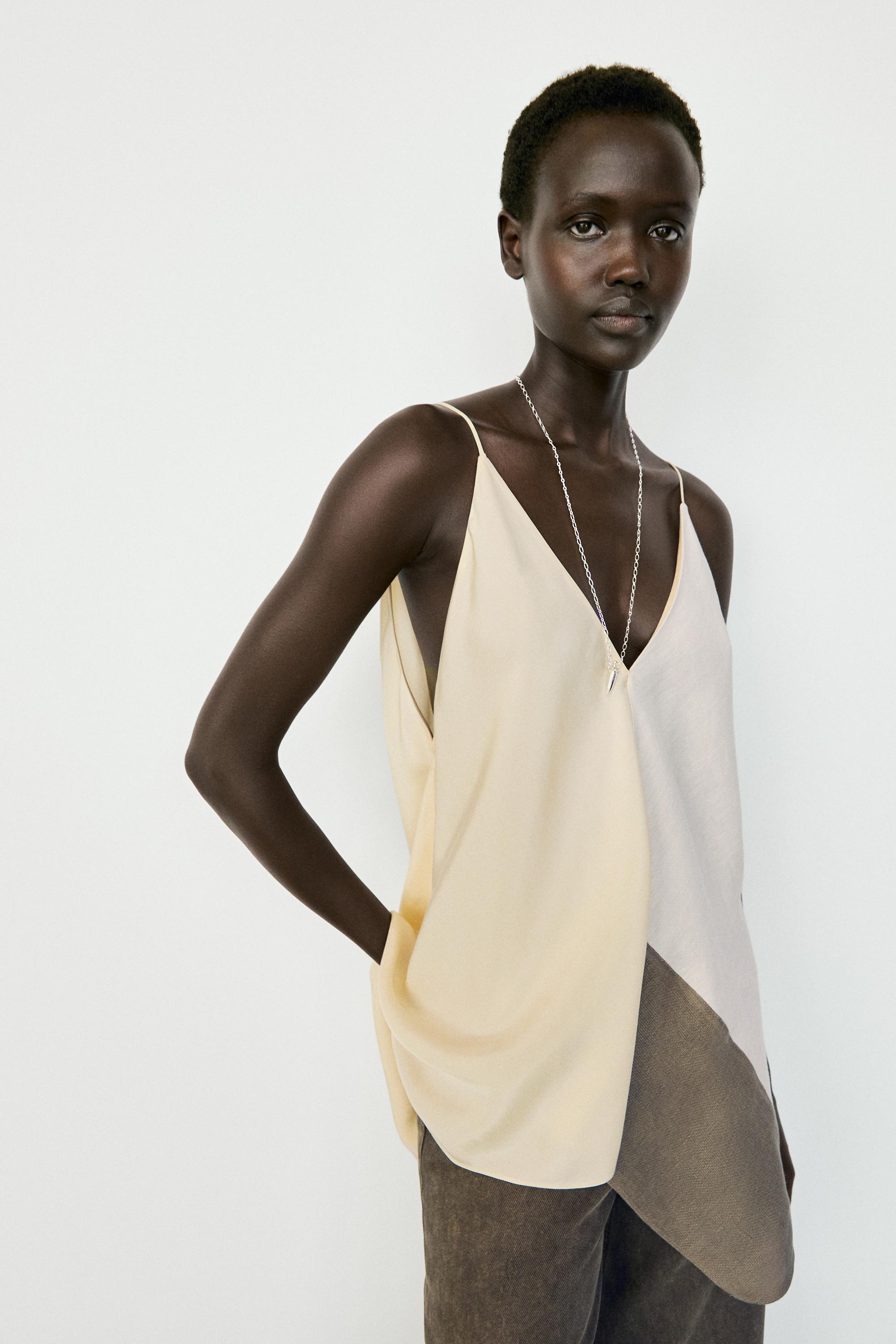 Asymmetric strappy flowing top