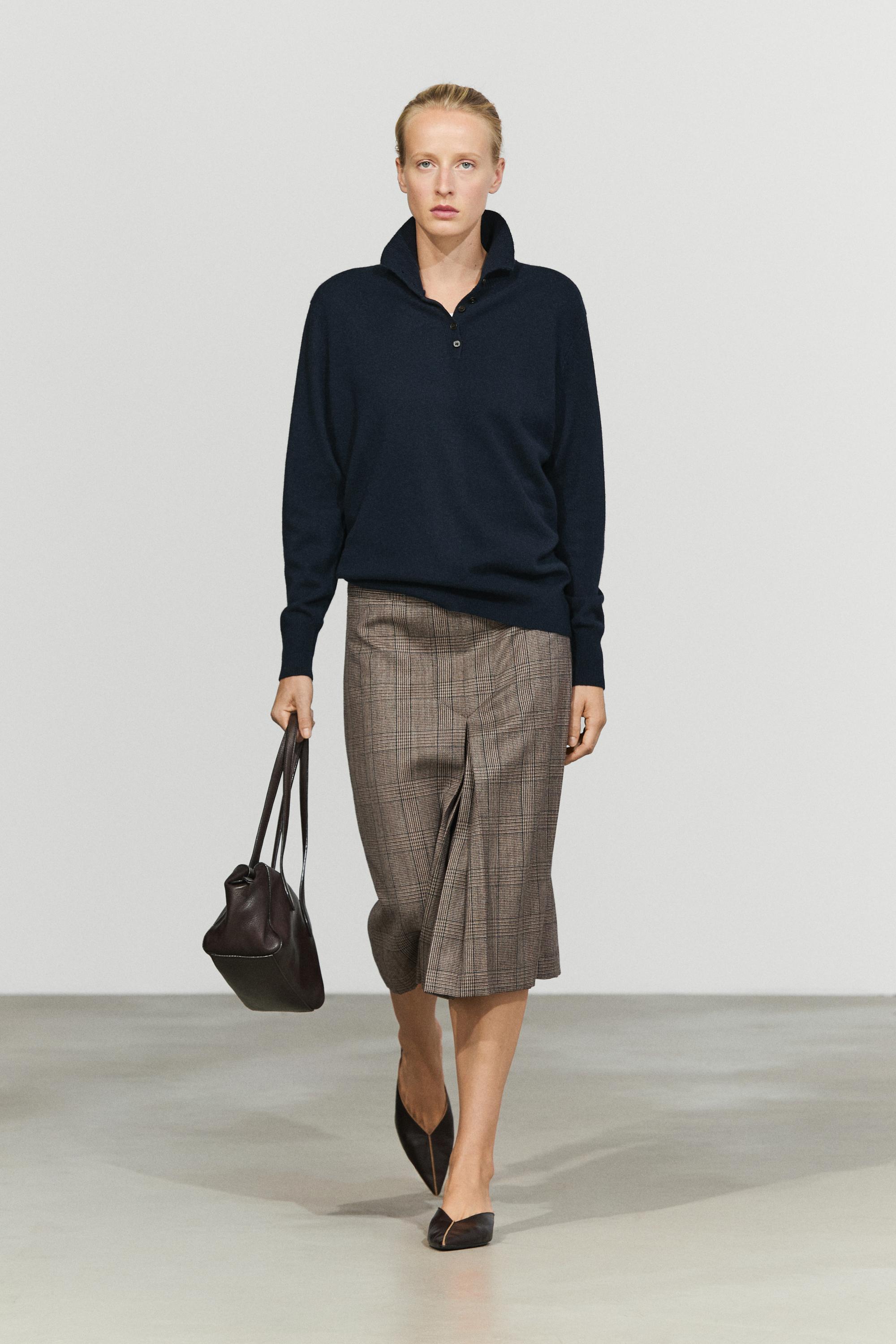 High neck knit sweater with button detail