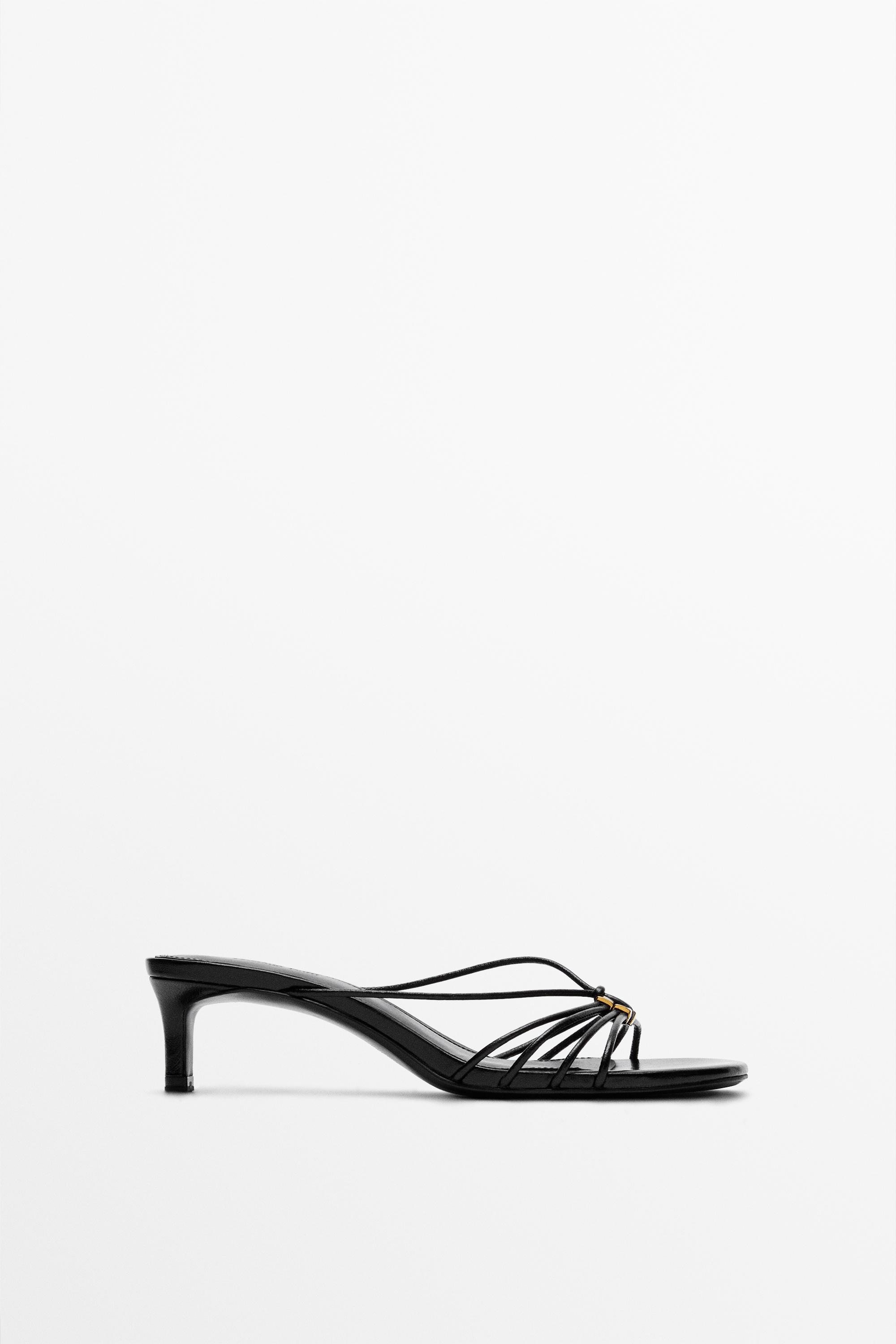 Strappy heeled sandals with embellished detail