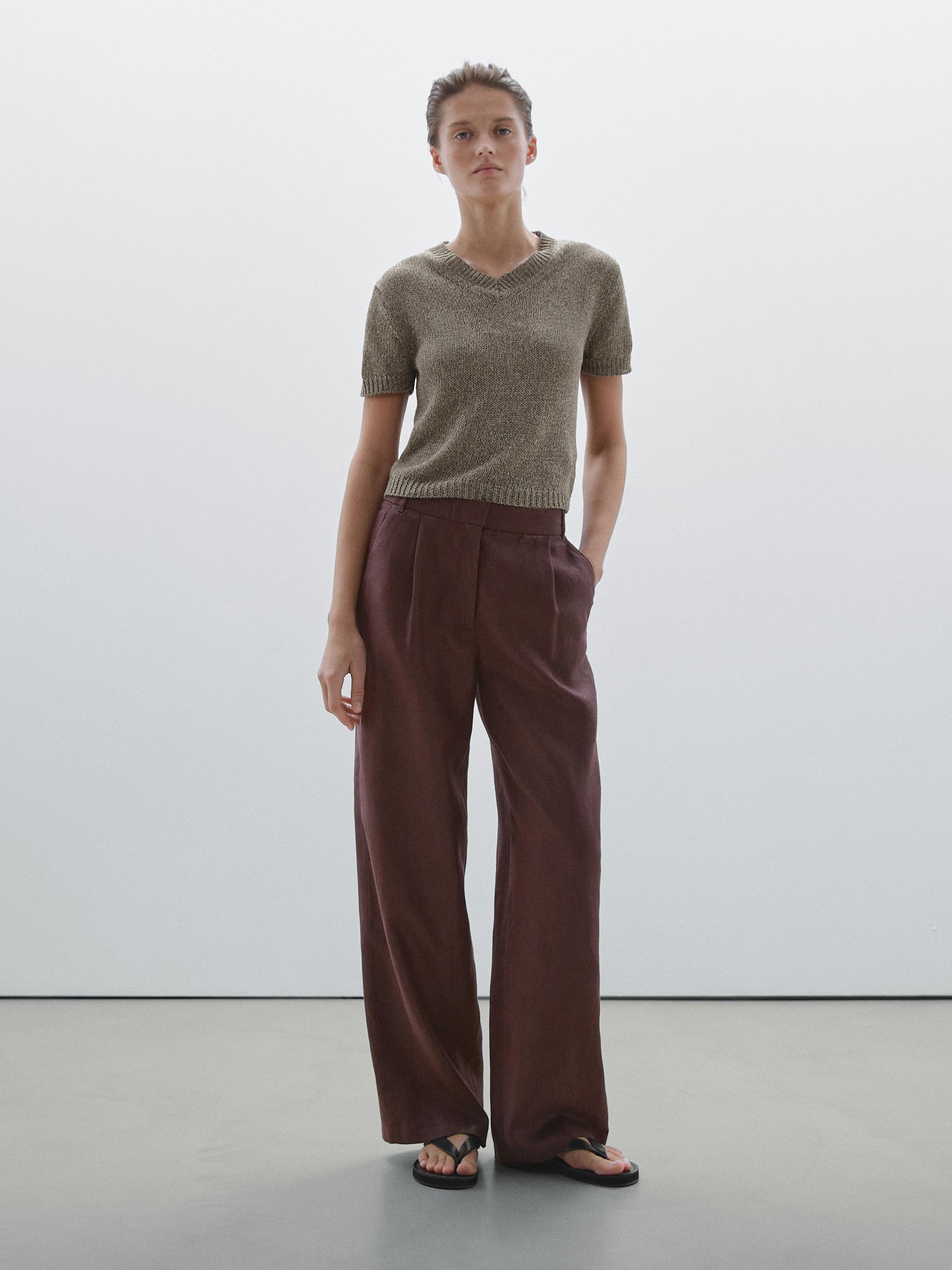 Knit sweater with fabric detail