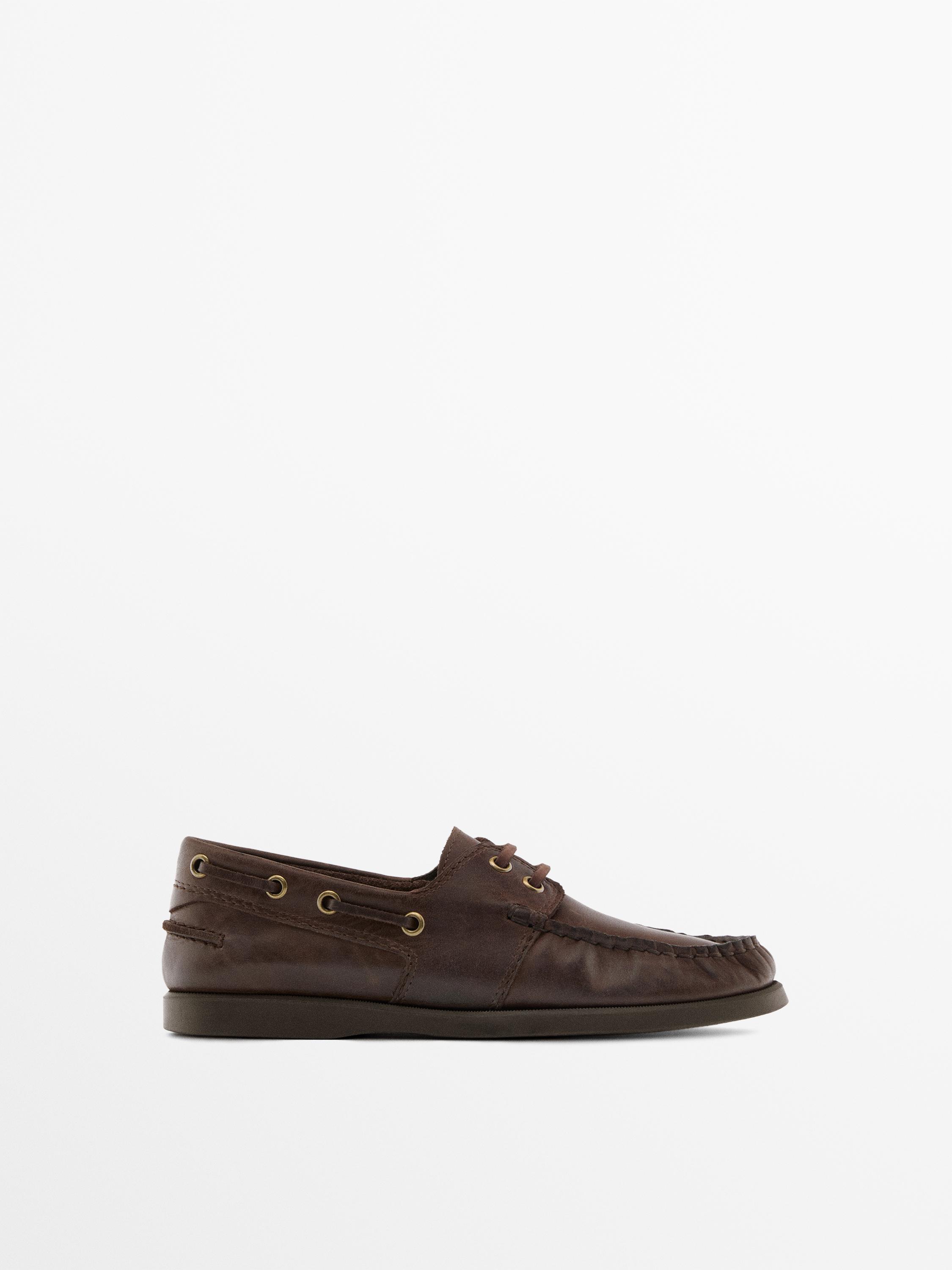 Oiled leather deck shoes