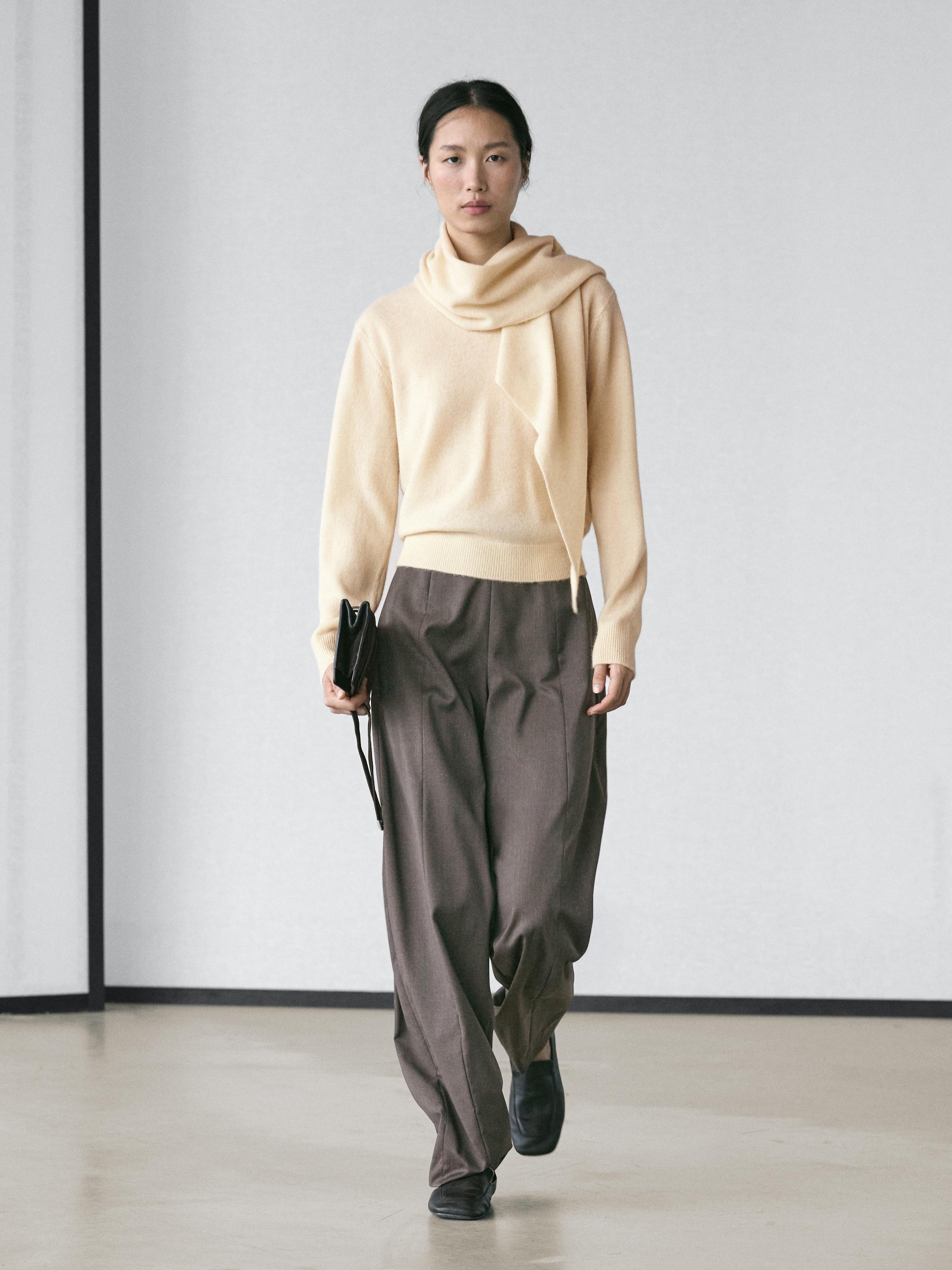 100% wool knit sweater with scarf detail