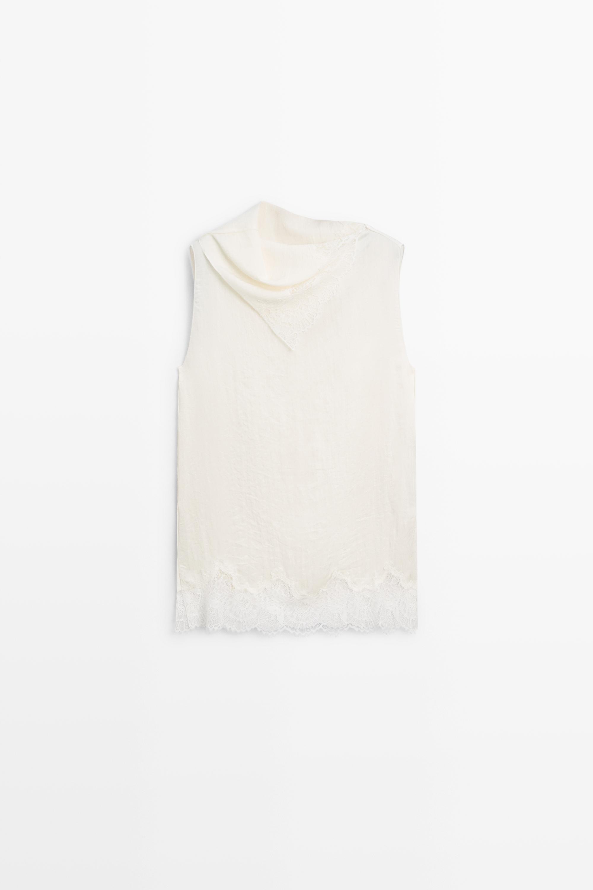 Asymmetric roll neck top with lace detail