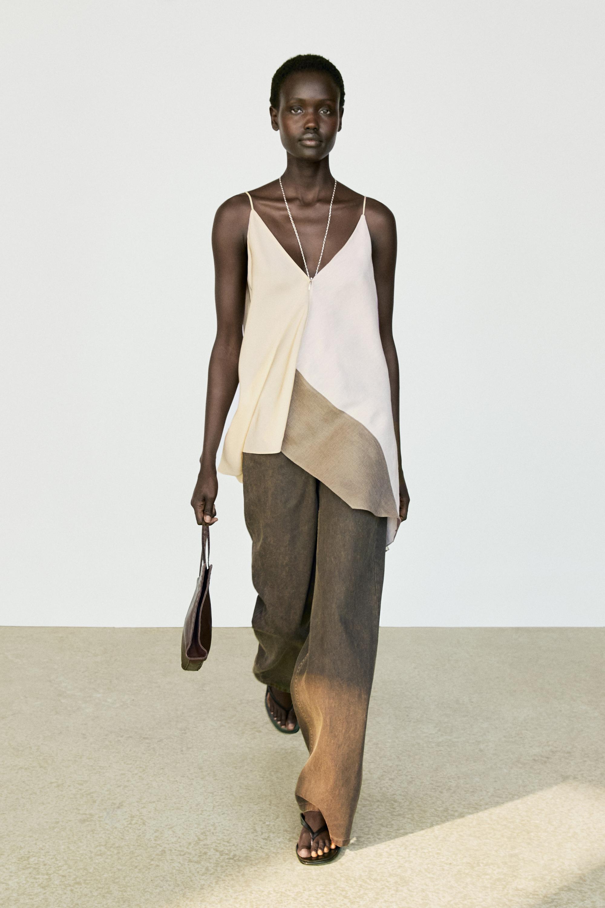 Asymmetric strappy flowing top