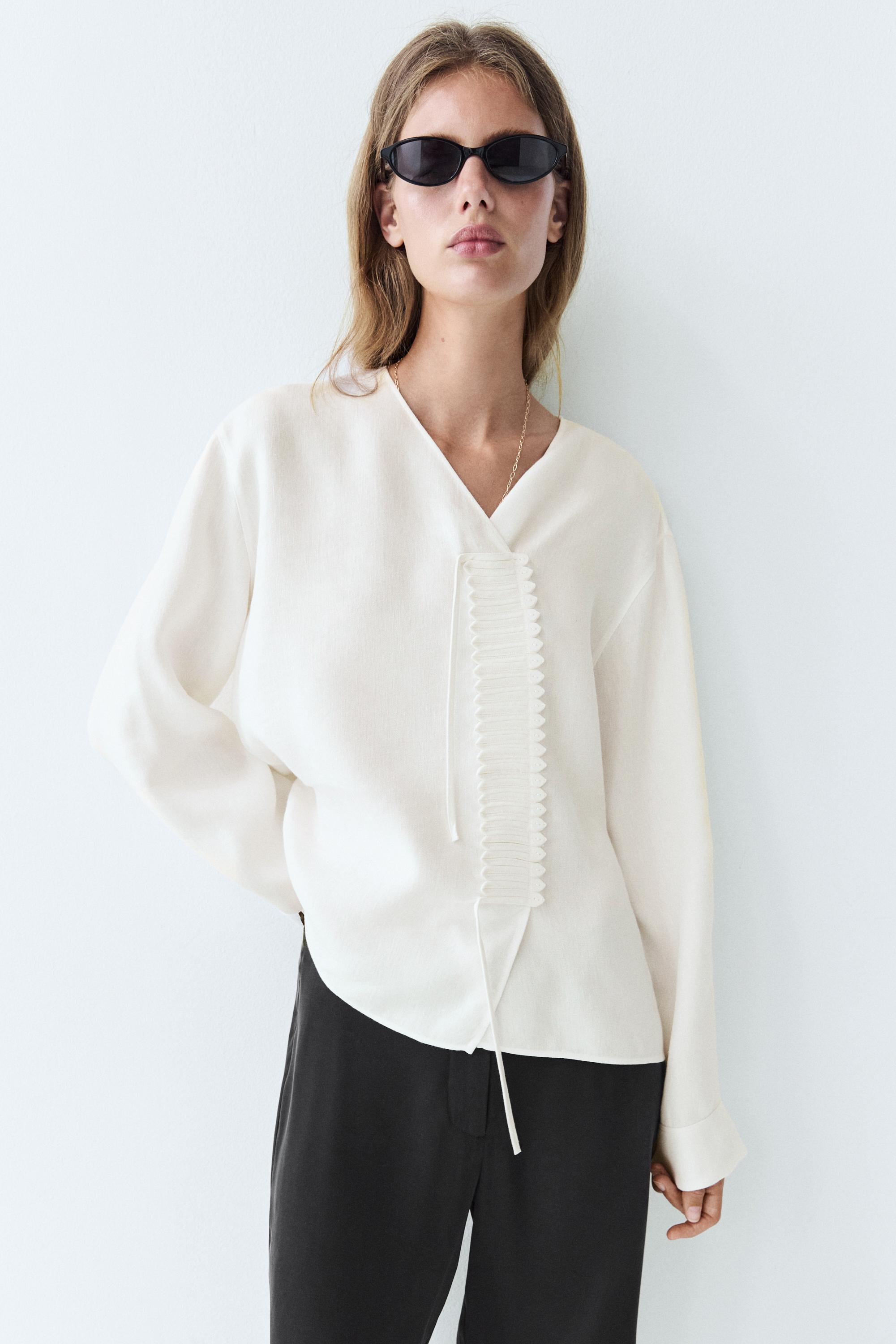 Flowing linen blend blouse with button detail