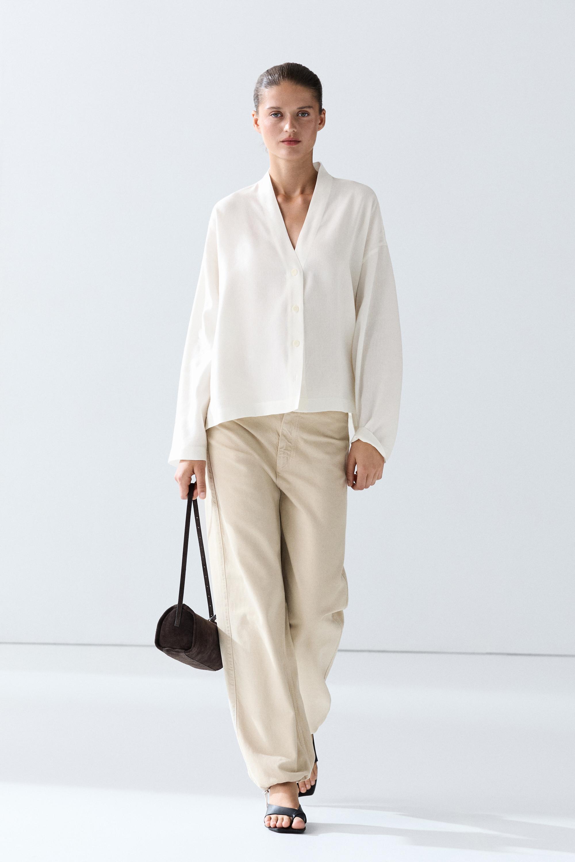 Flowing linen-blend V-neck shirt