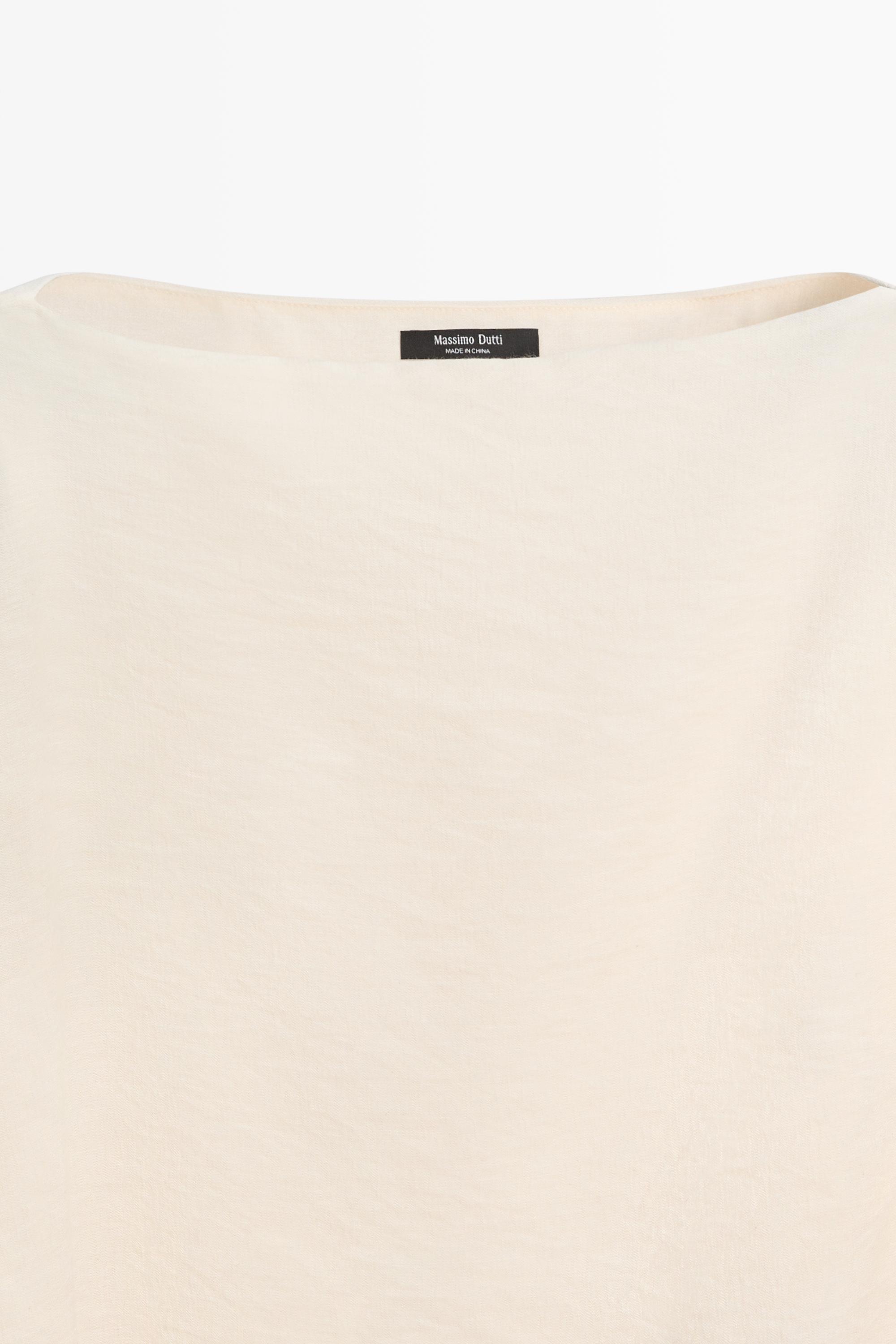 Asymmetric cape-style flowing blouse