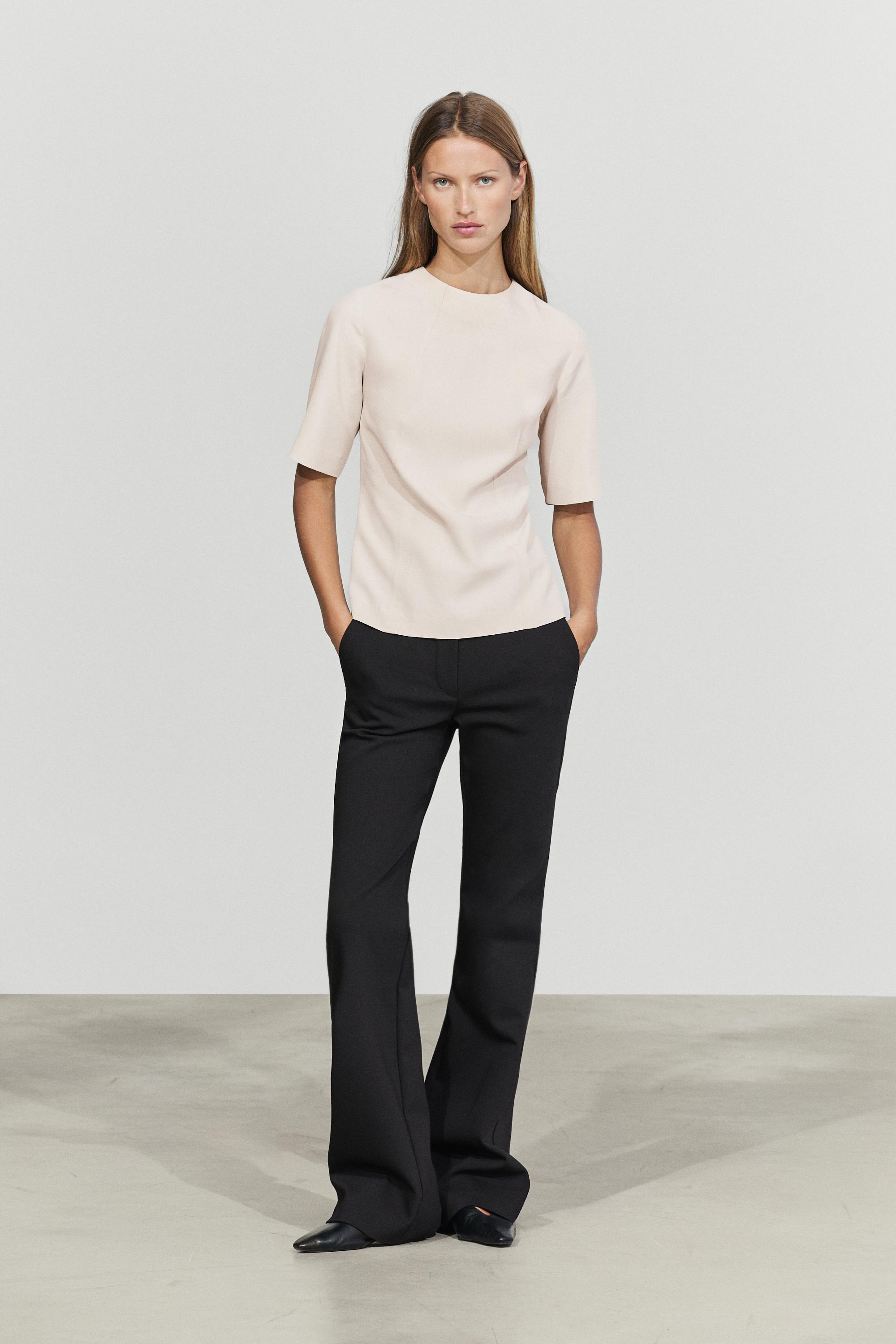 Flowing elbow-length sleeve top