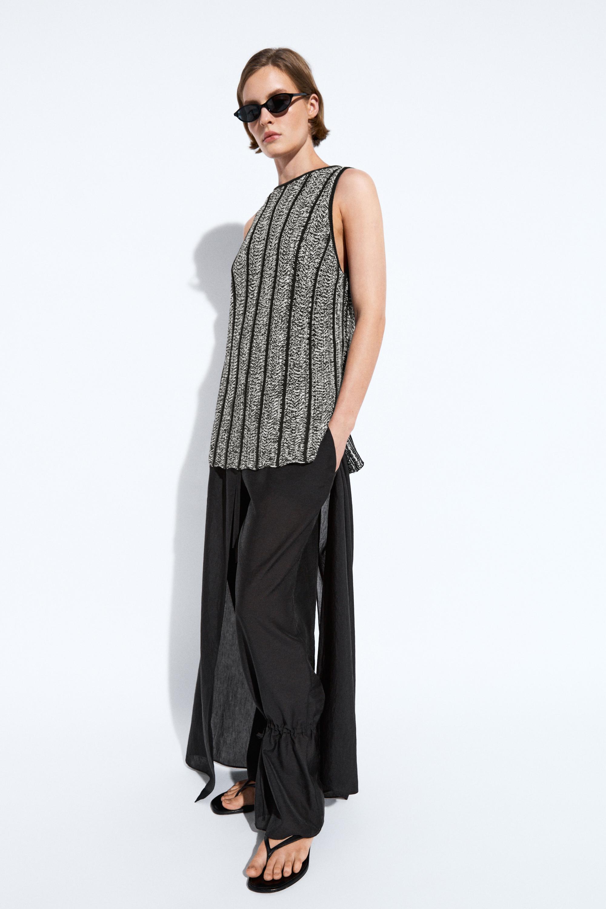 Cotton-blend flecked knit top