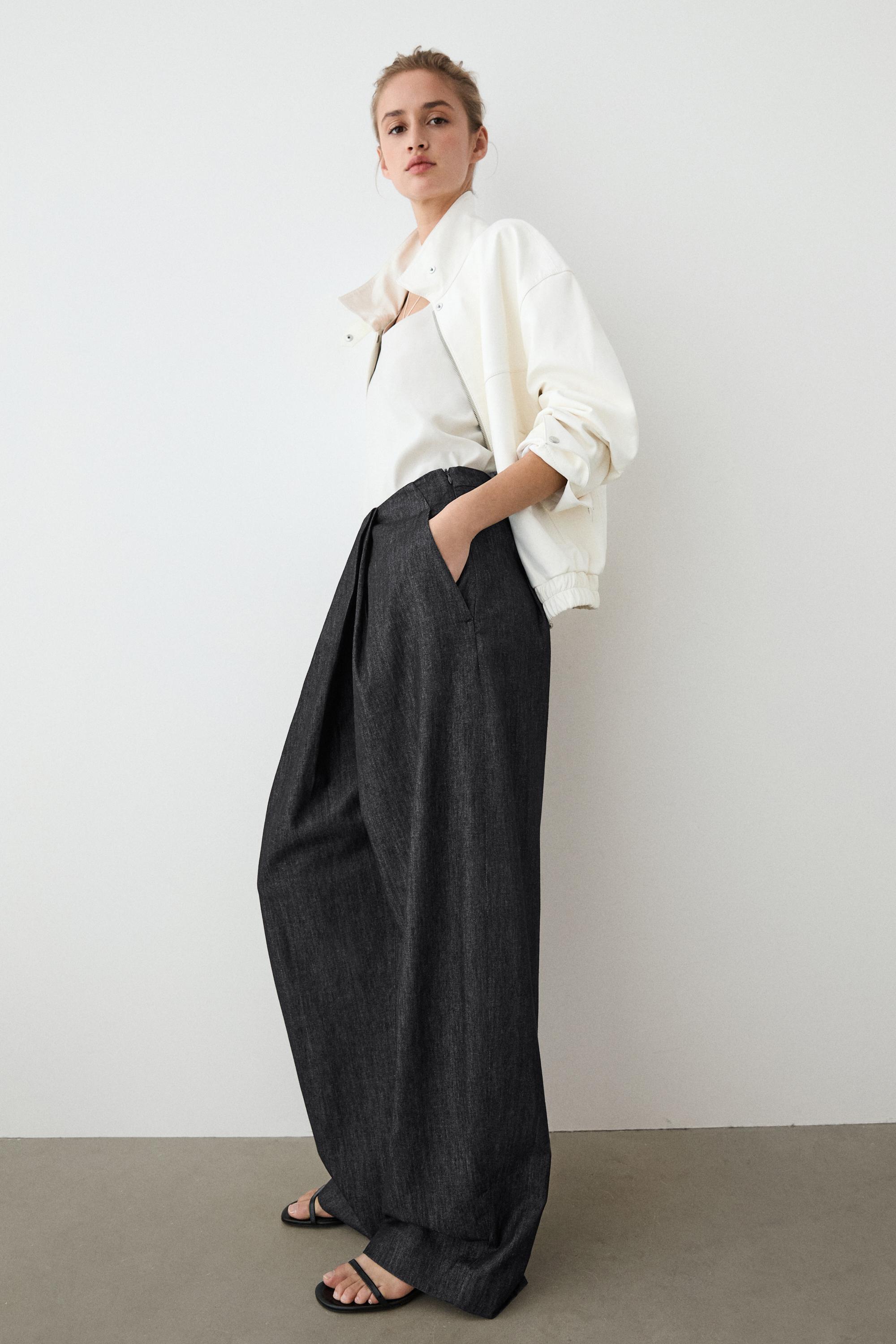 High-waist pants with crossover detail