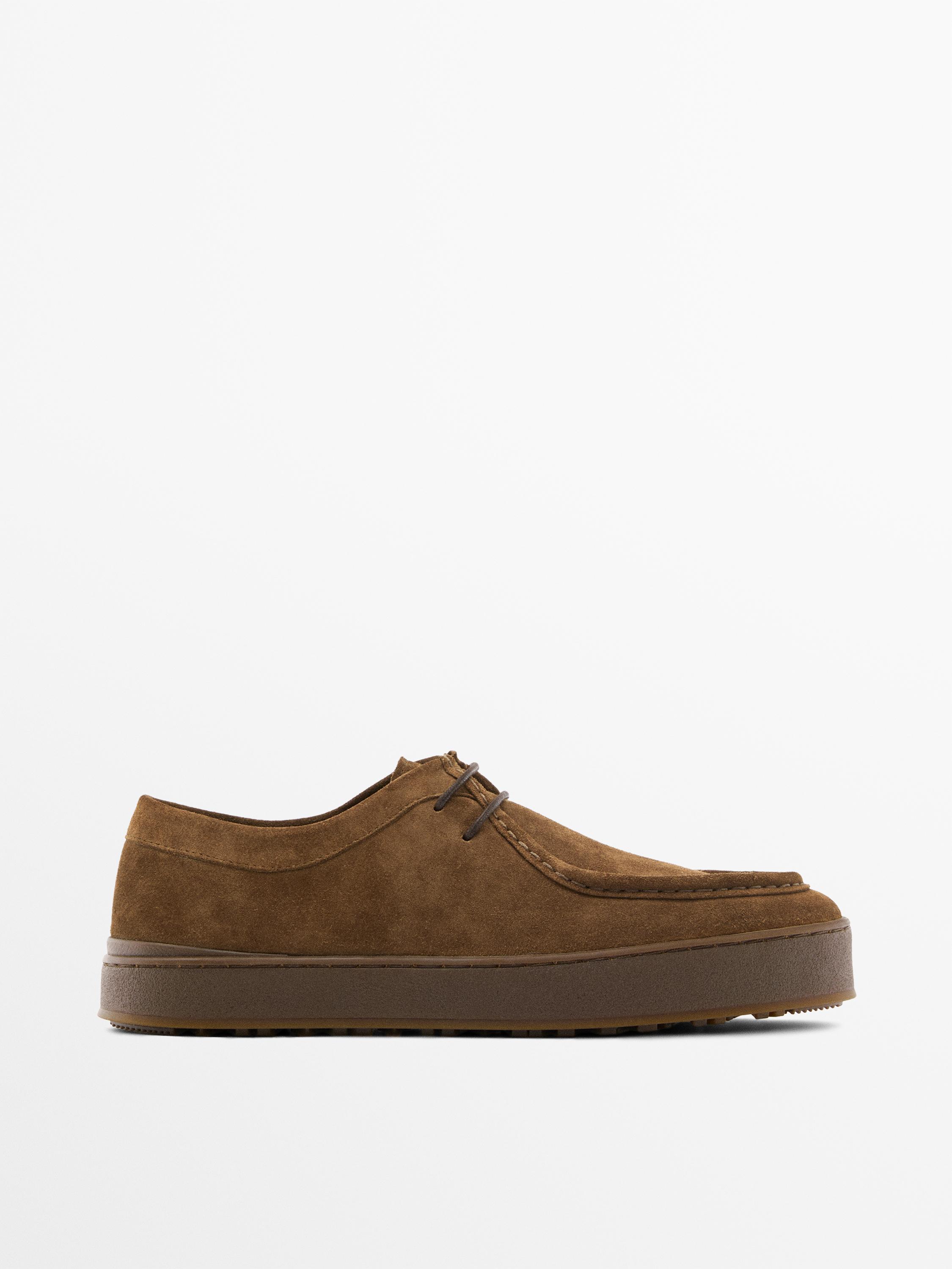 Leather shoes with moc toe and chunky sole