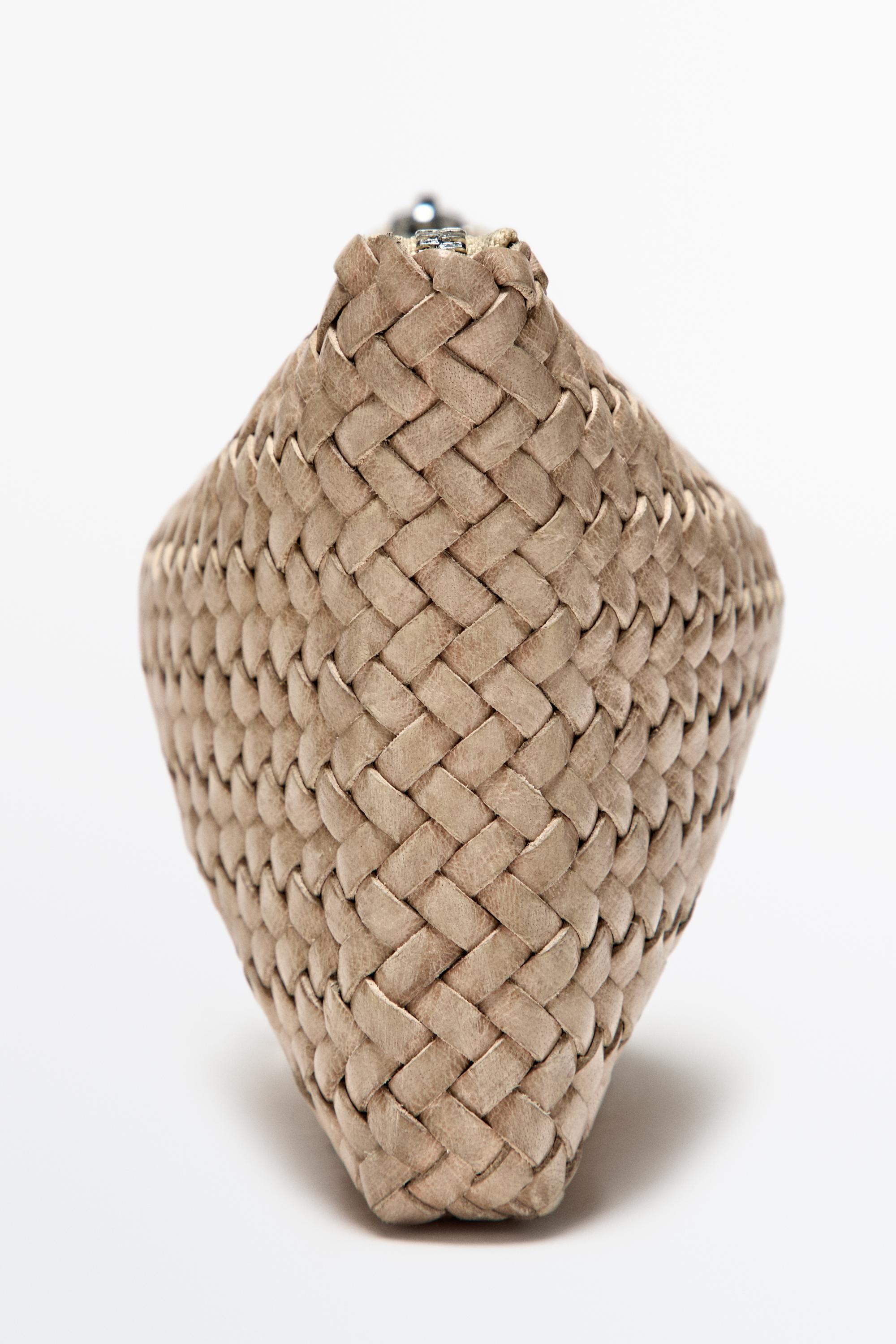 Braided nappa leather pouch bag