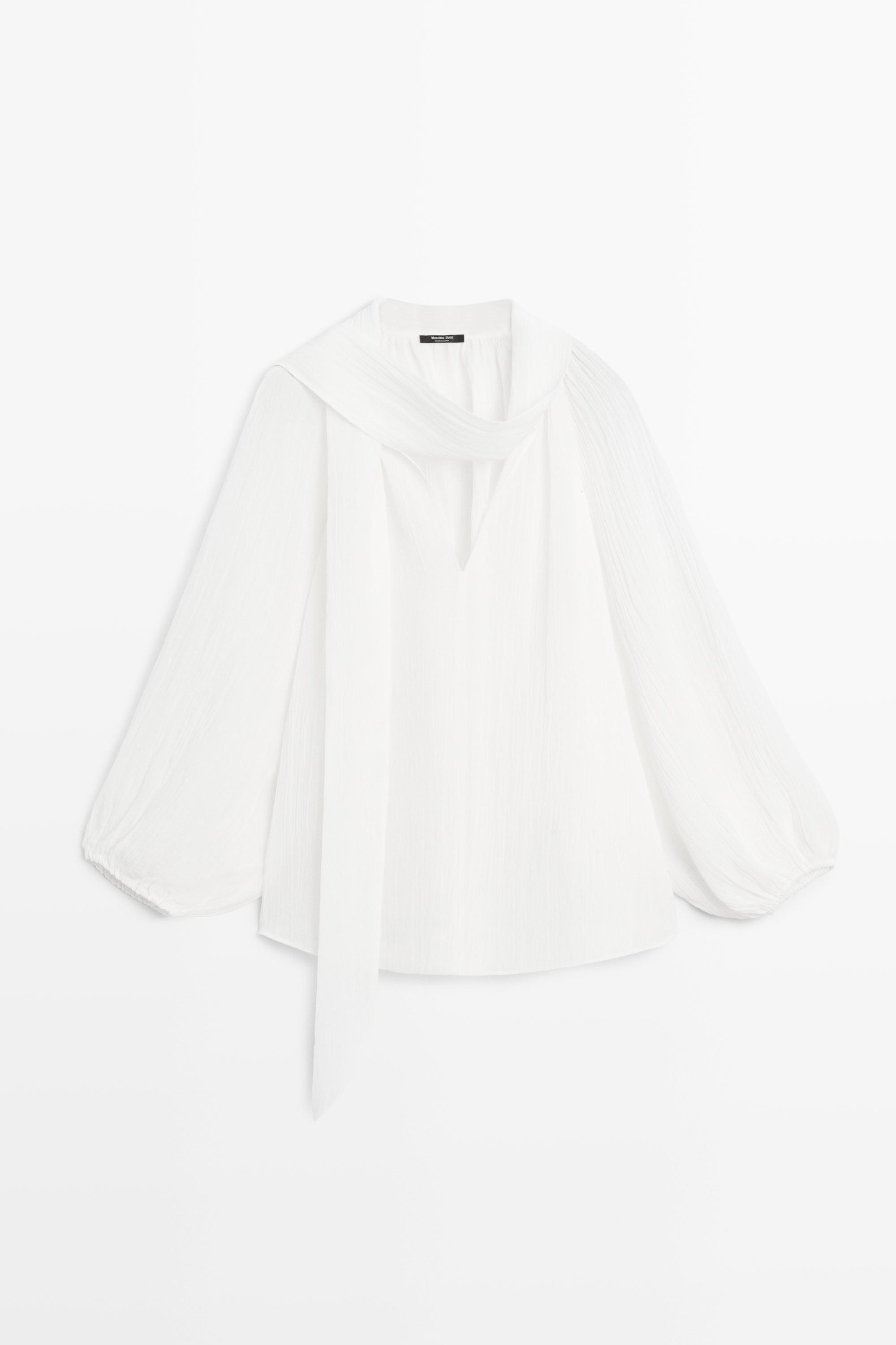 Flowing V-neck blouse with tie