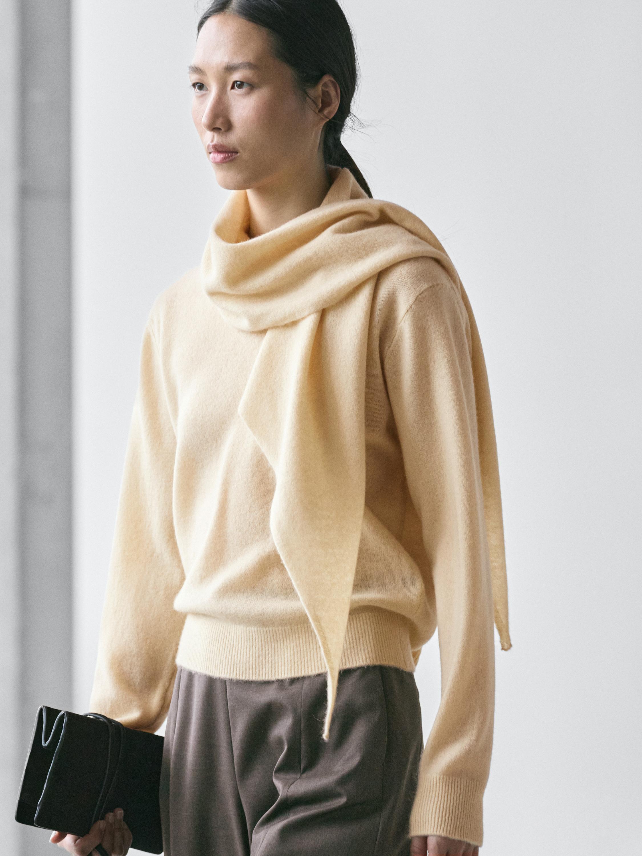 100% wool knit sweater with scarf detail