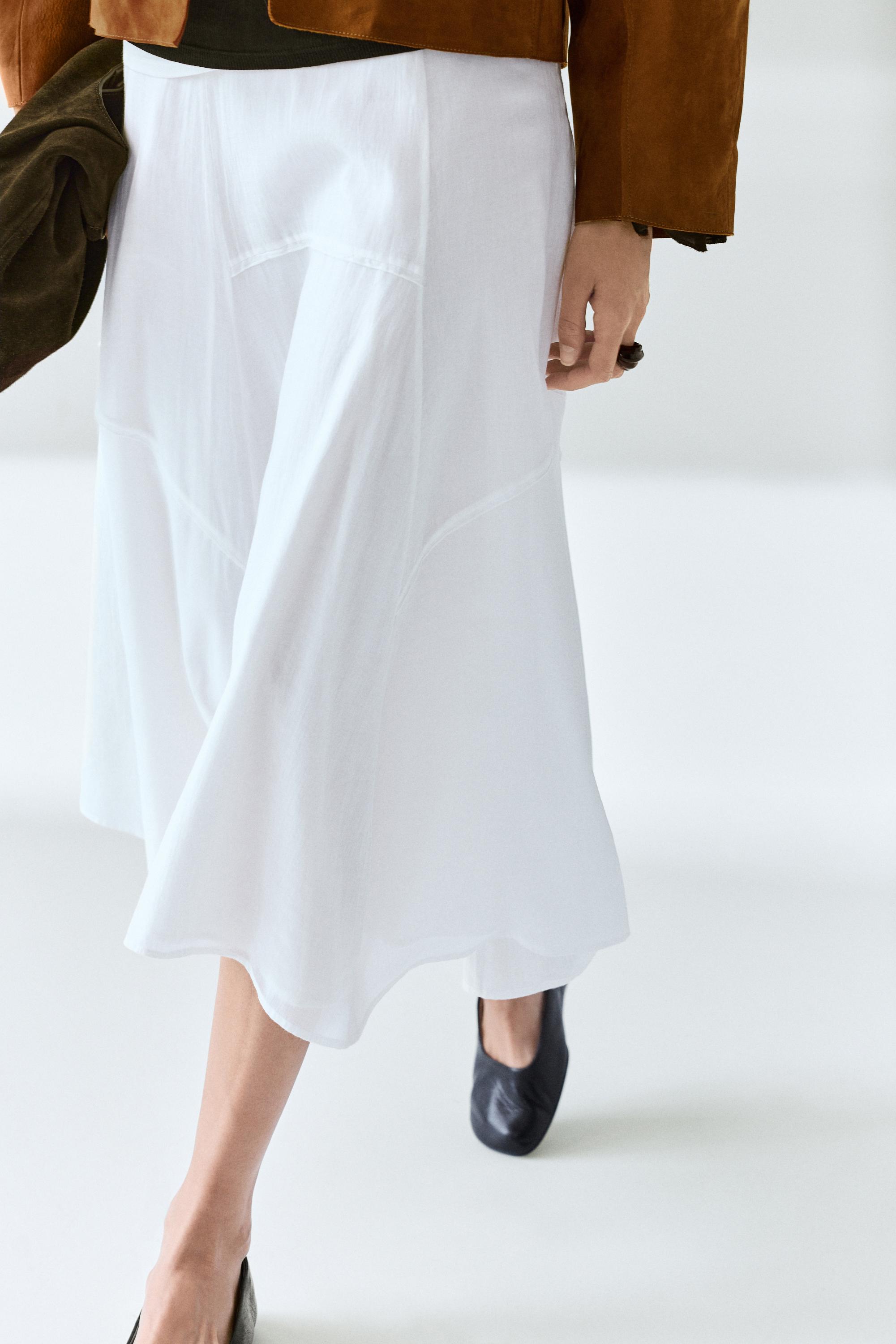 Flowing midi skirt with panel detail