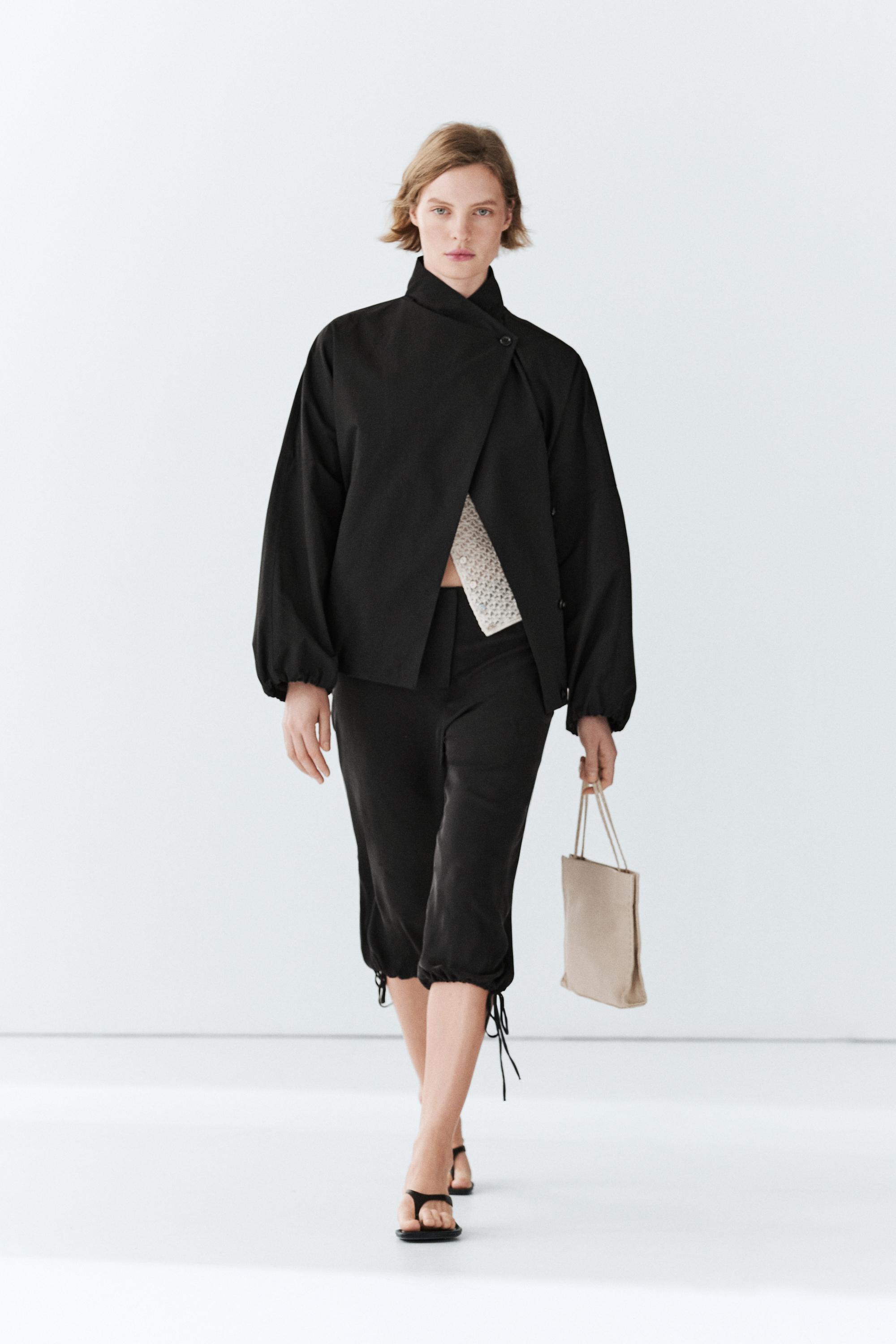 Technical bomber jacket with side button