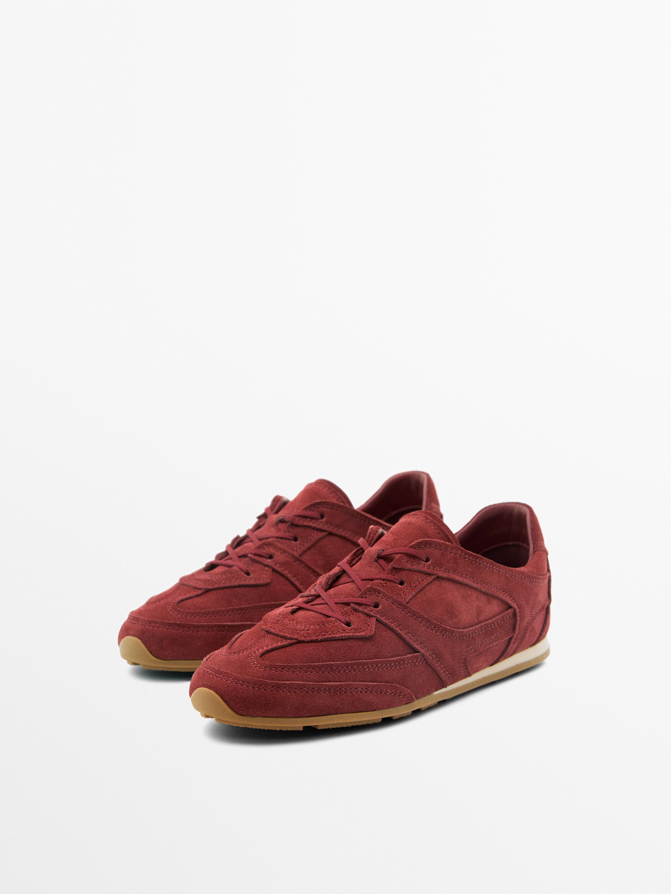Split leather trainers with piece details