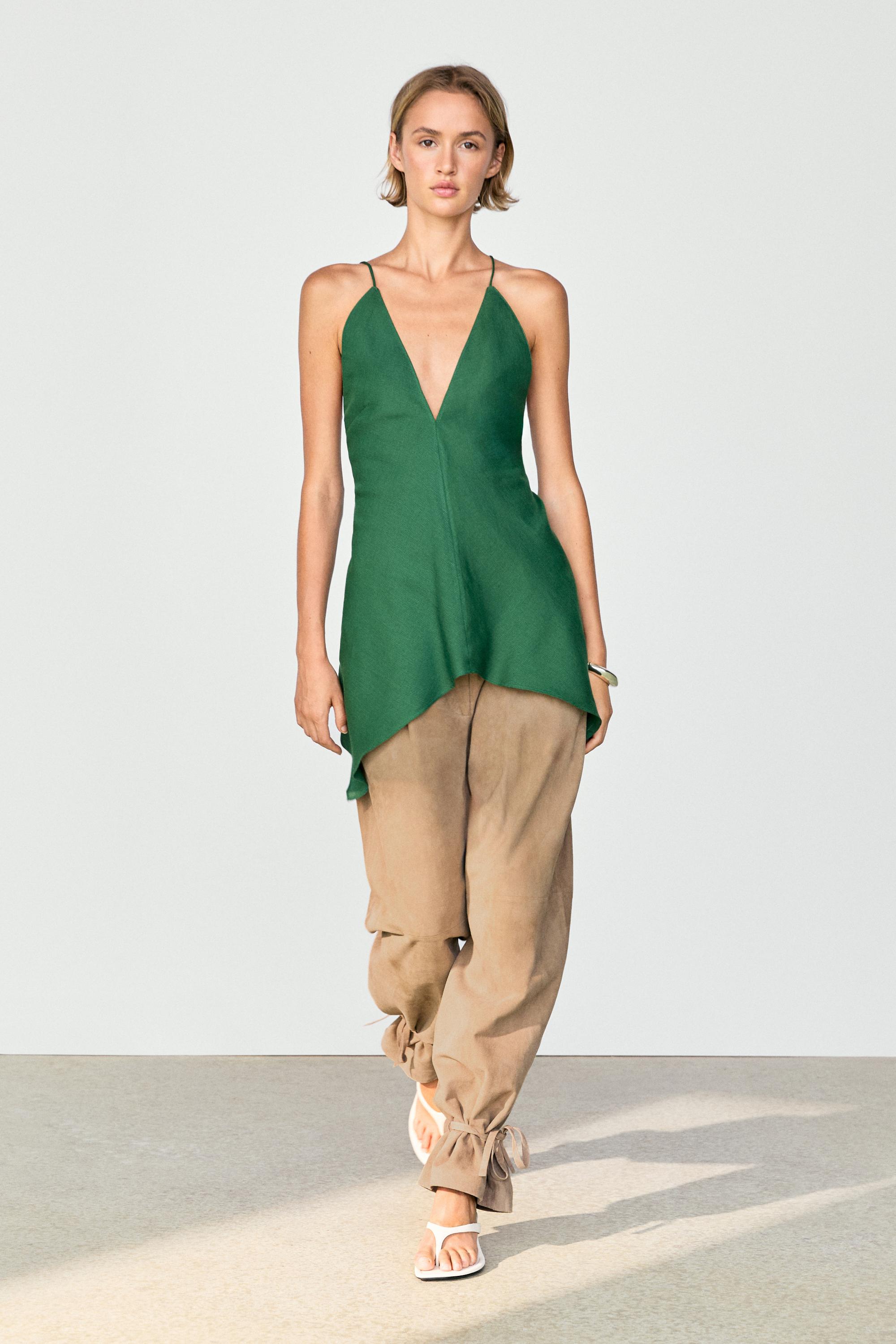 Asymmetric spaghetti strap top