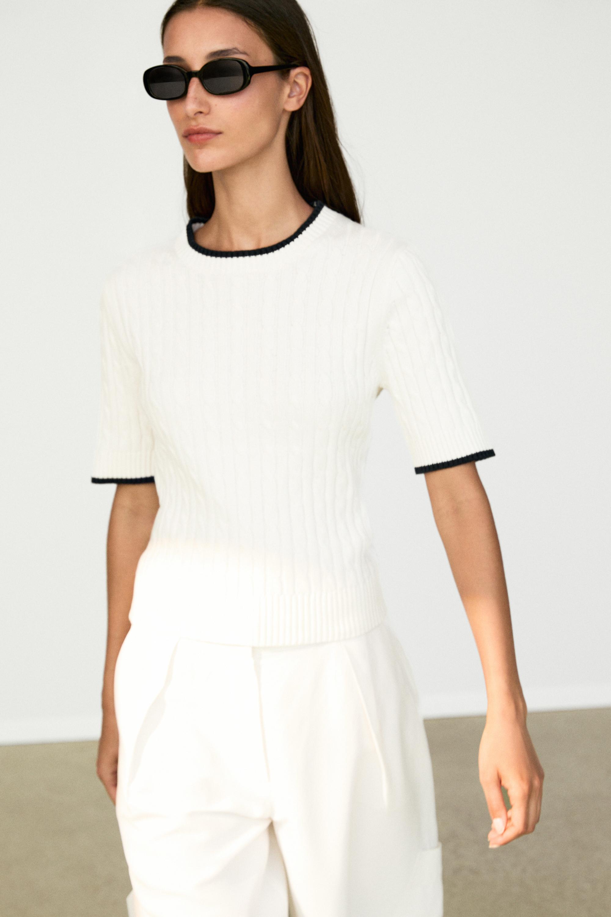 Short sleeve cable-knit sweater