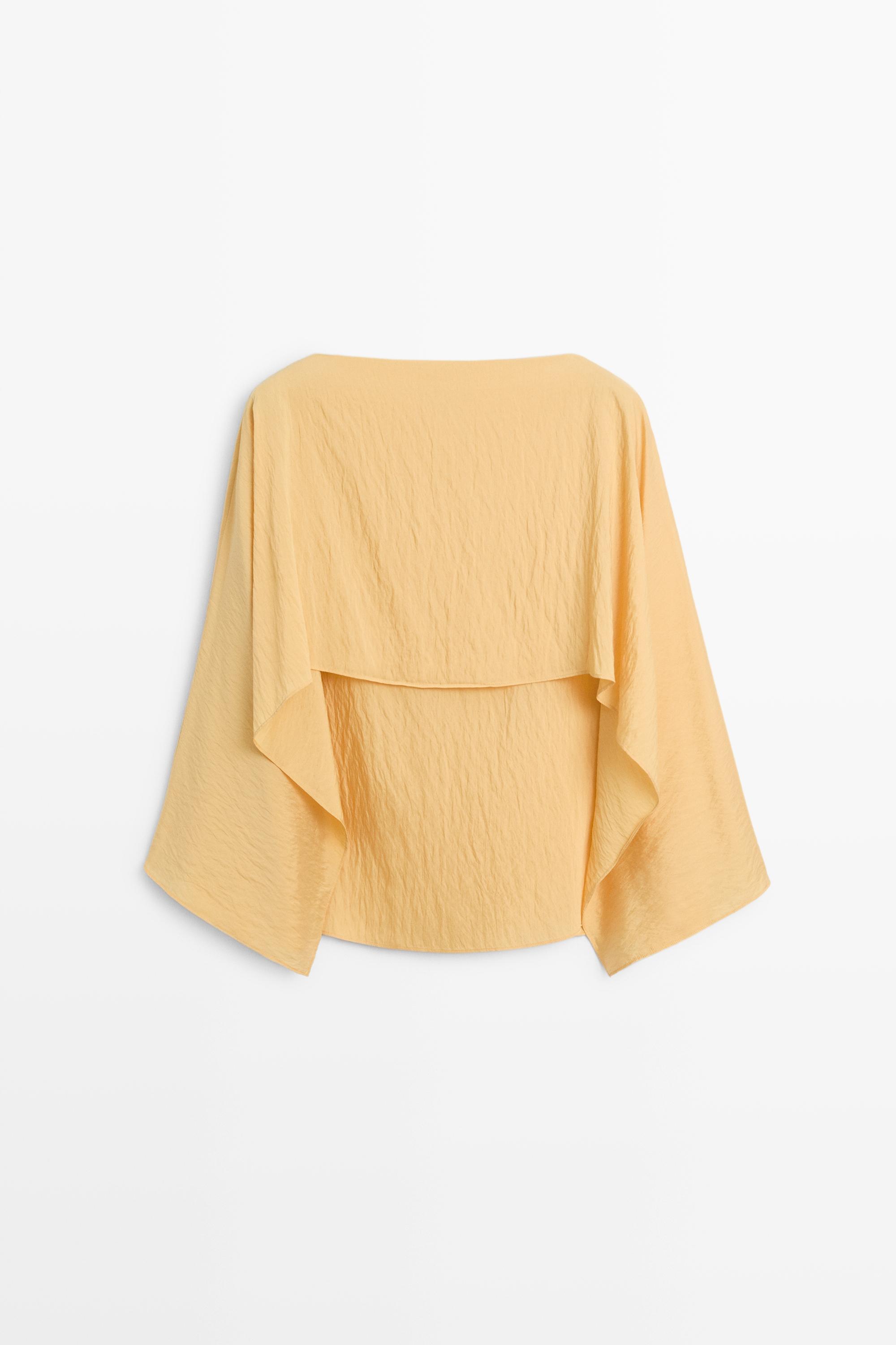 Flowing cape-style blouse