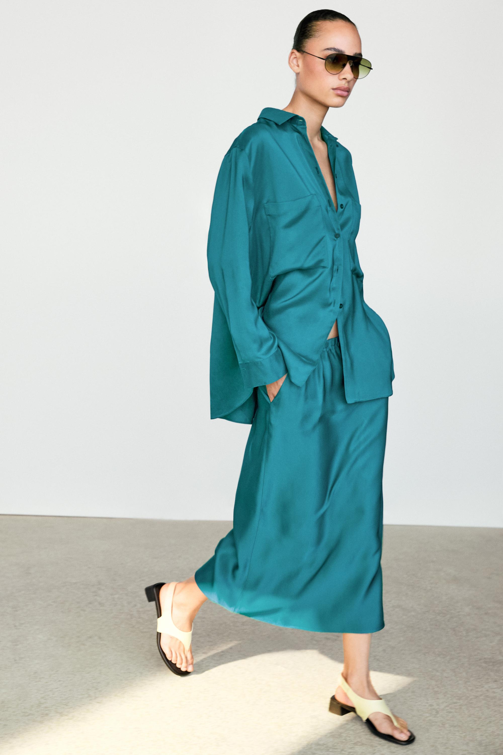 Flowing satin shirt with pockets