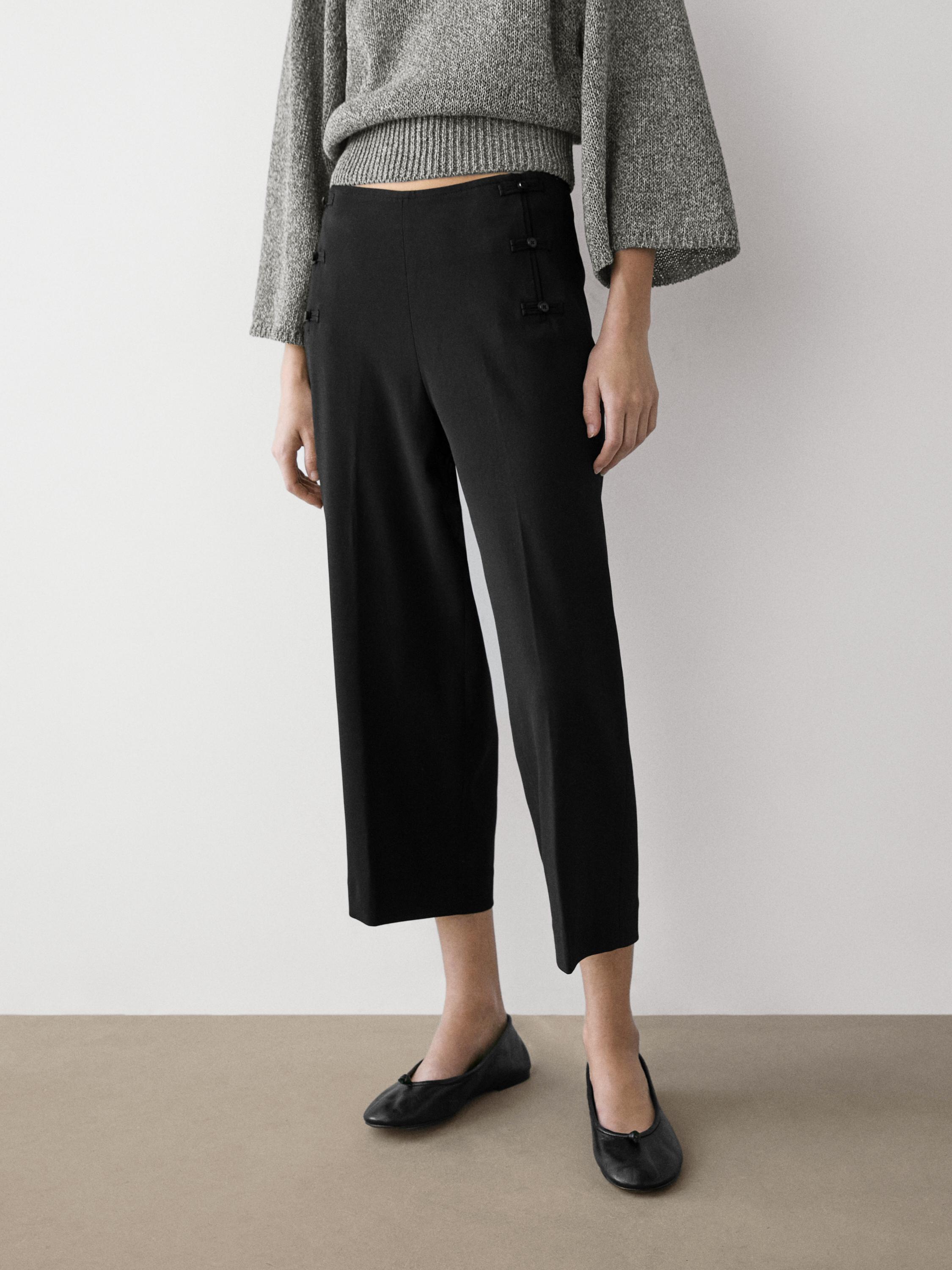 Capris with button details