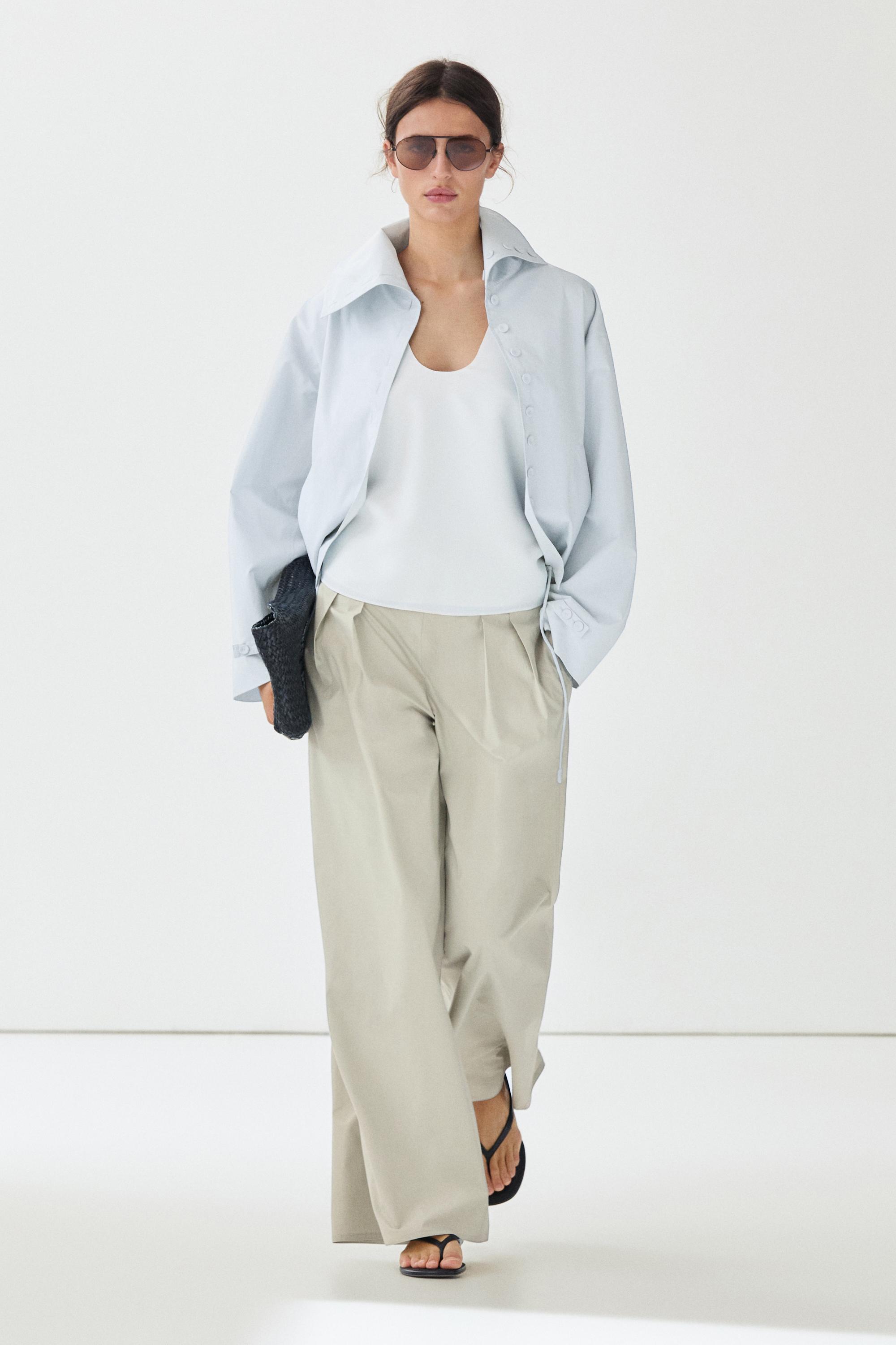Wide-leg pants with pleated sash detail