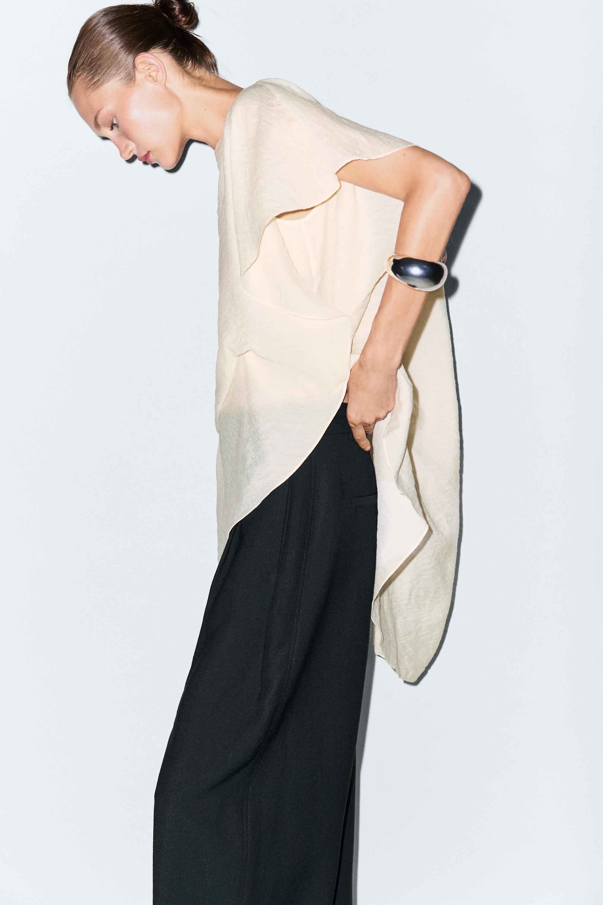 Asymmetric cape-style flowing blouse