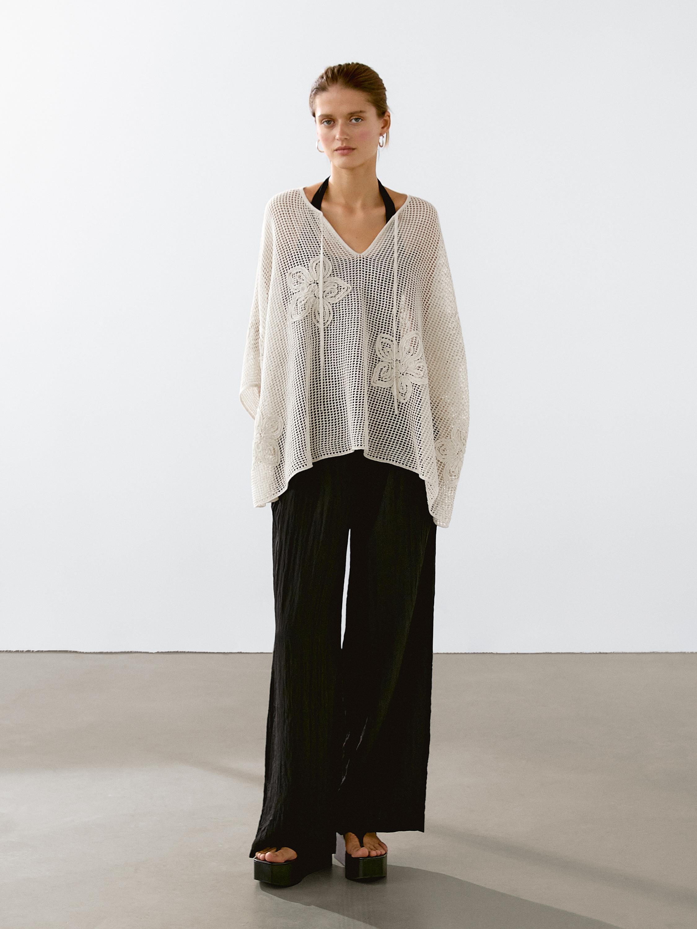 Embroidered cutwork cape