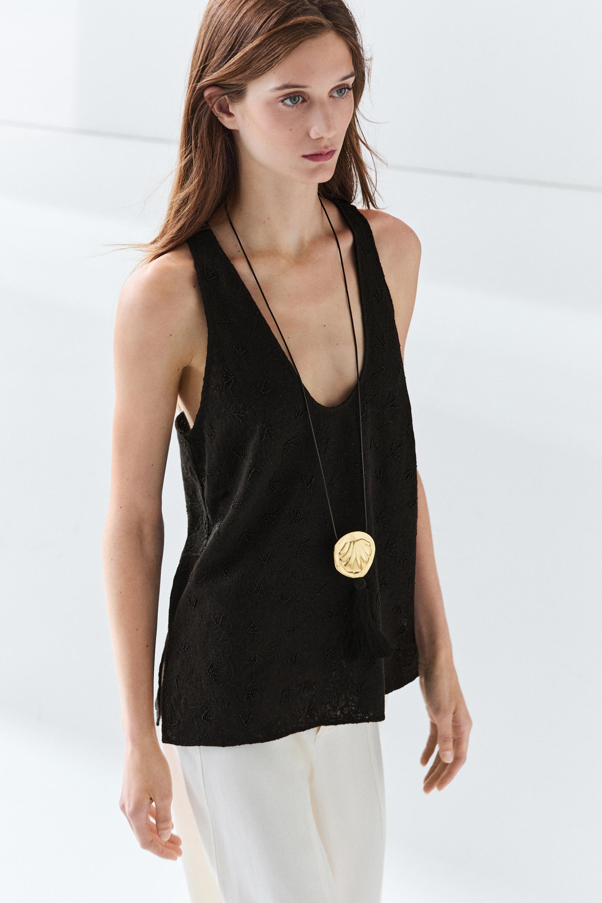 Flowing top with embroidery
