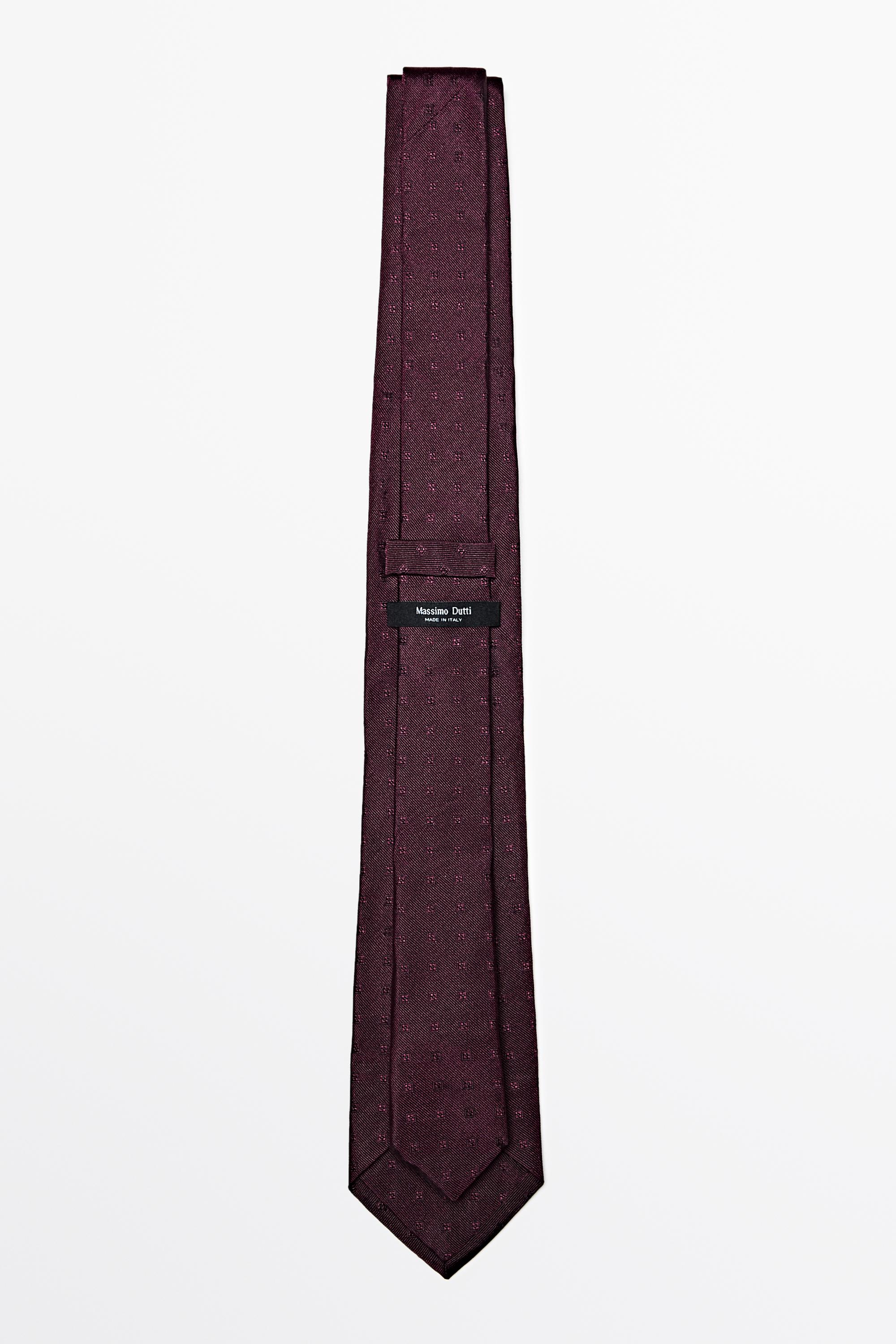 100% silk tie with embroidered detail