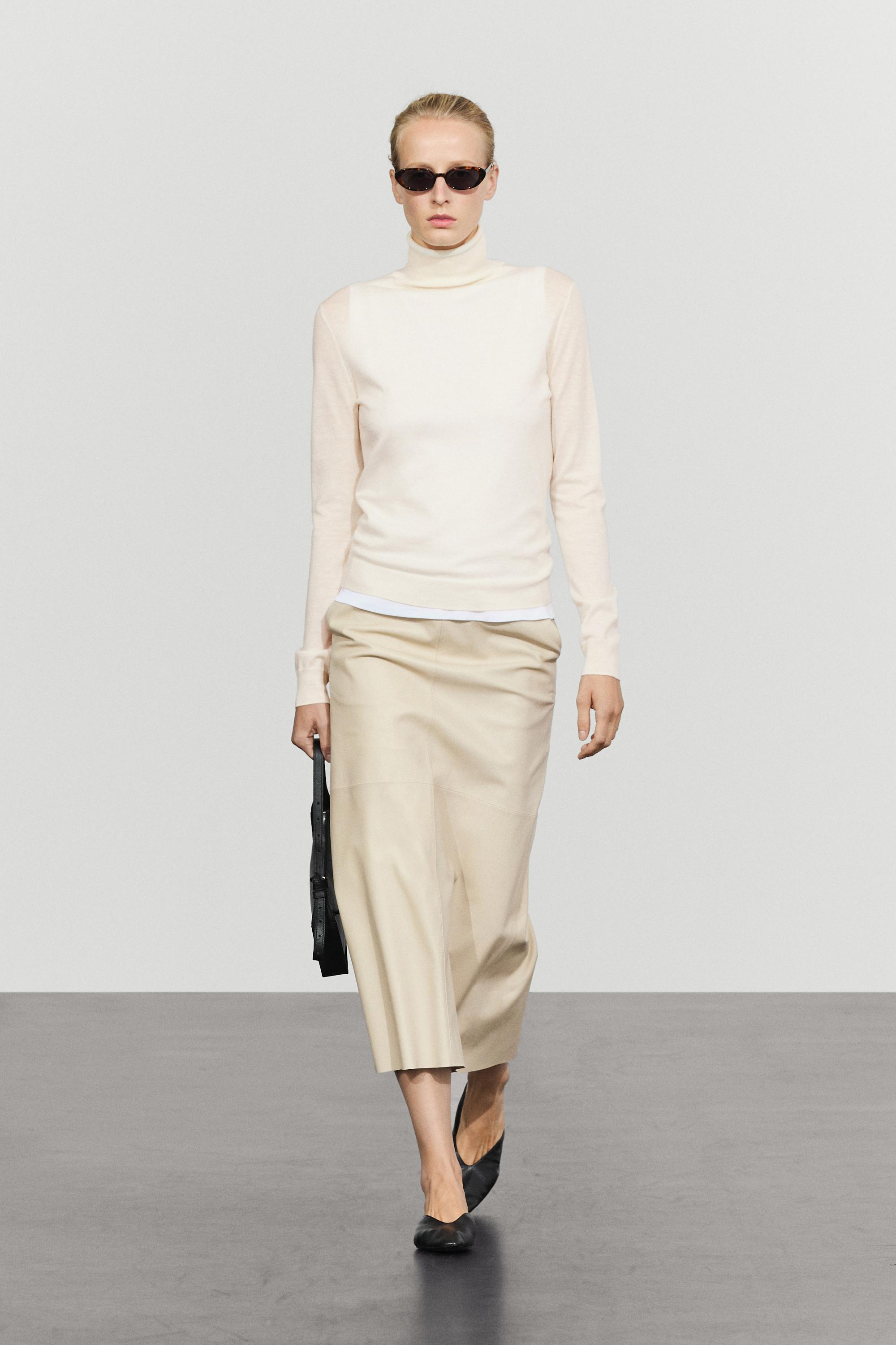 Wool-blend turtleneck knit sweater