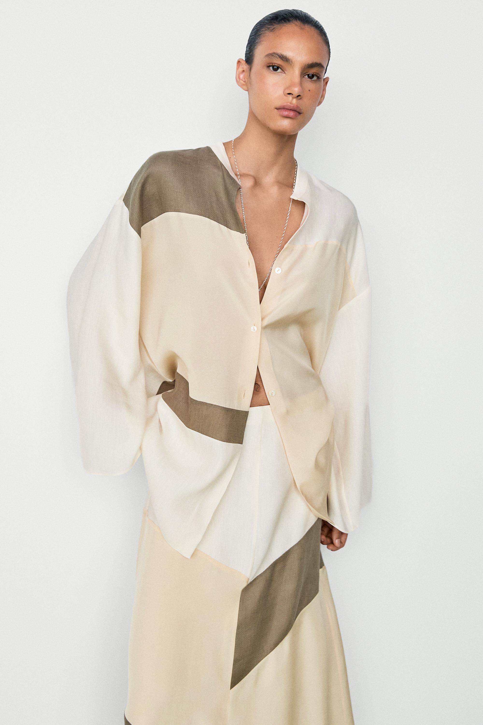 Flowing stand collar shirt with contrast details