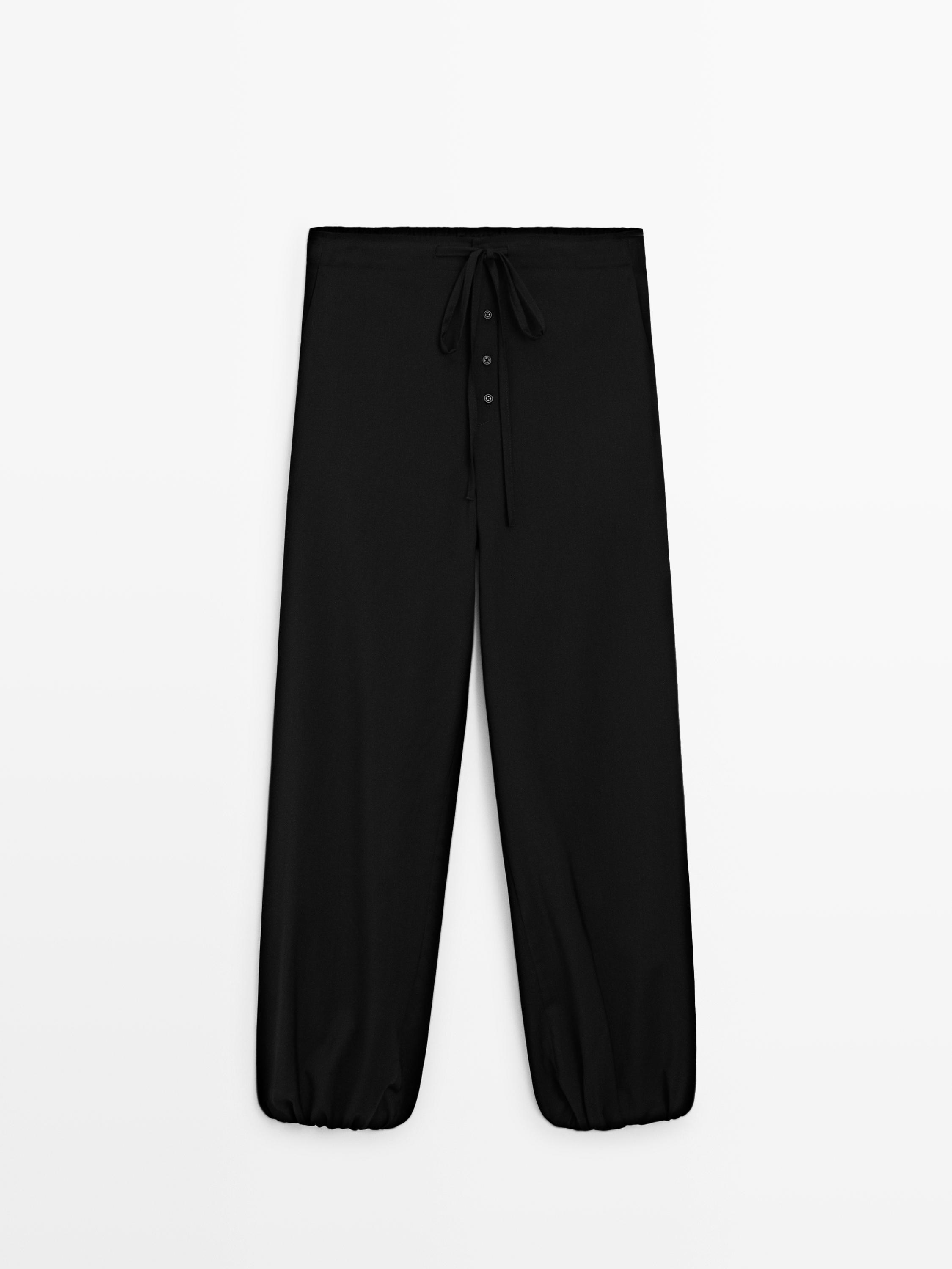 Wool sarouel trousers with tie detail