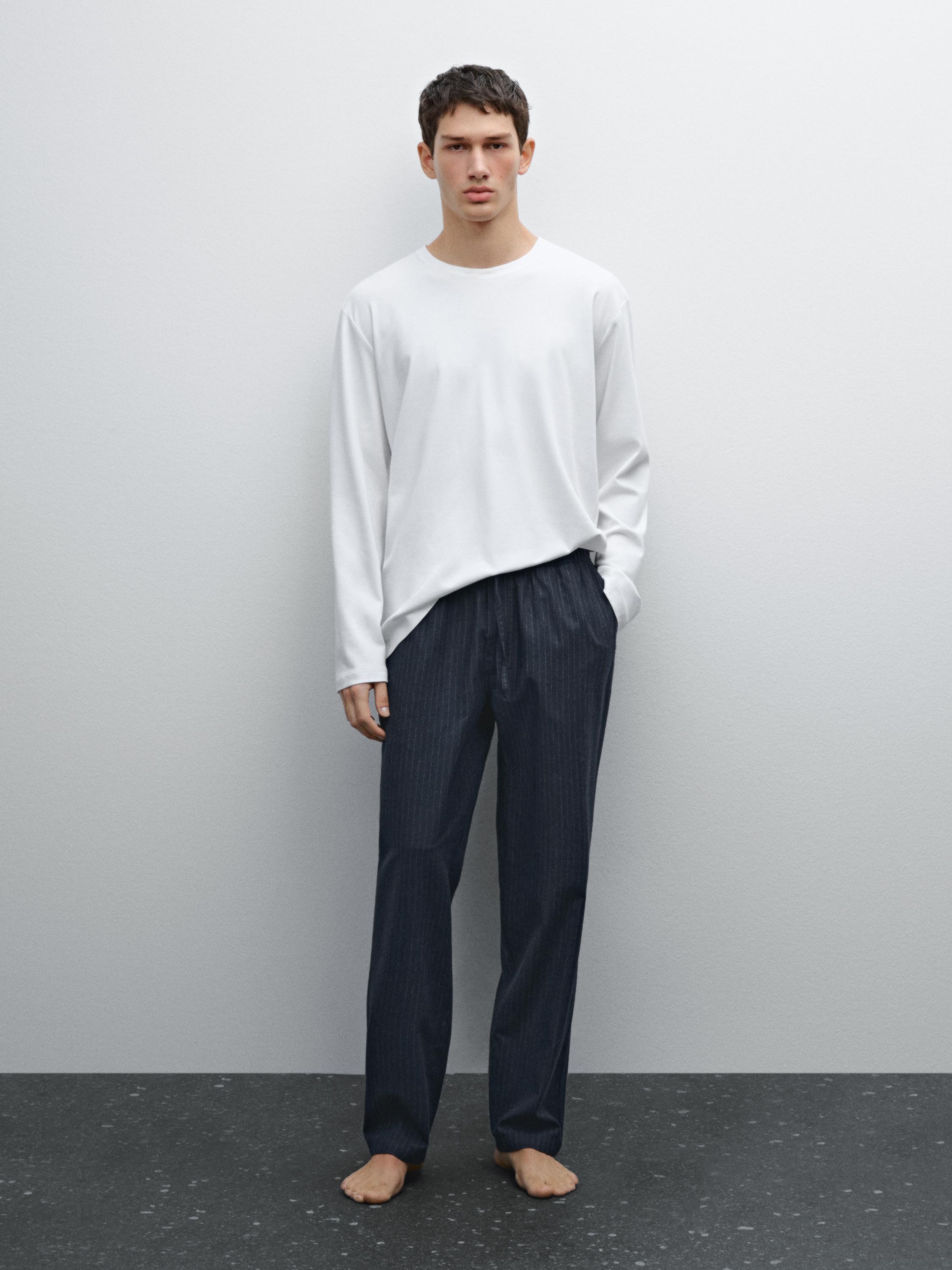 Long sleeve pyjama top and striped trousers