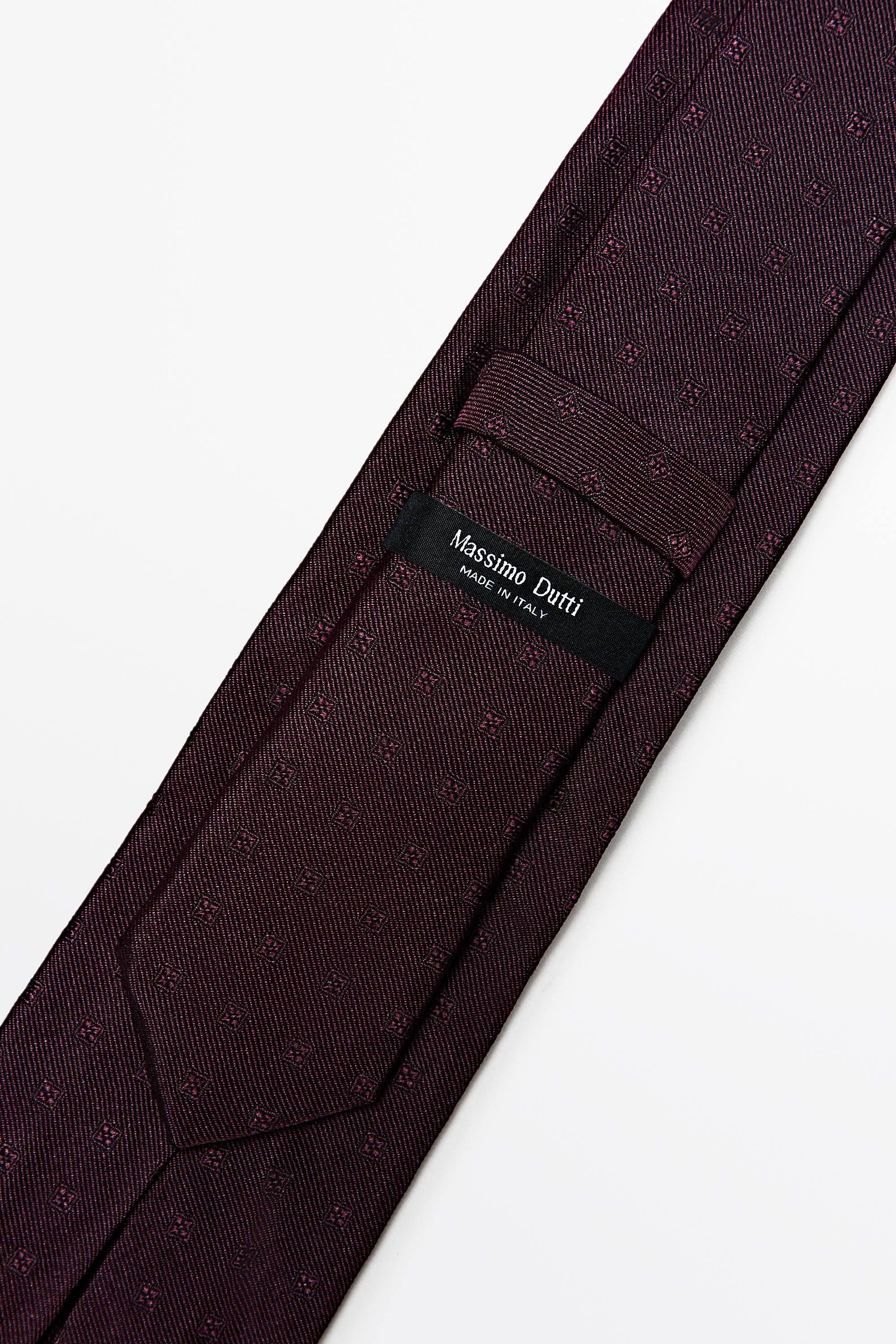 100% silk tie with embroidered detail