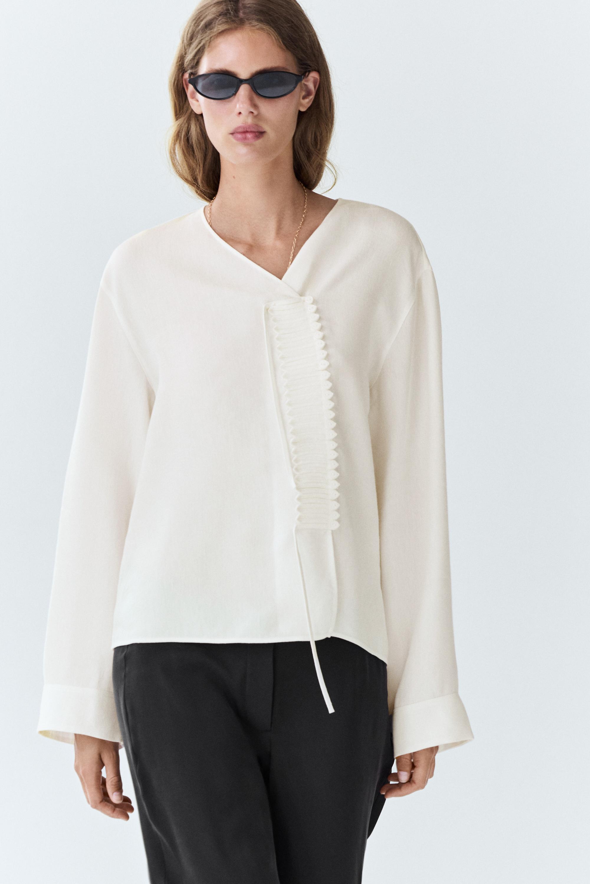 Flowing linen blend blouse with button detail