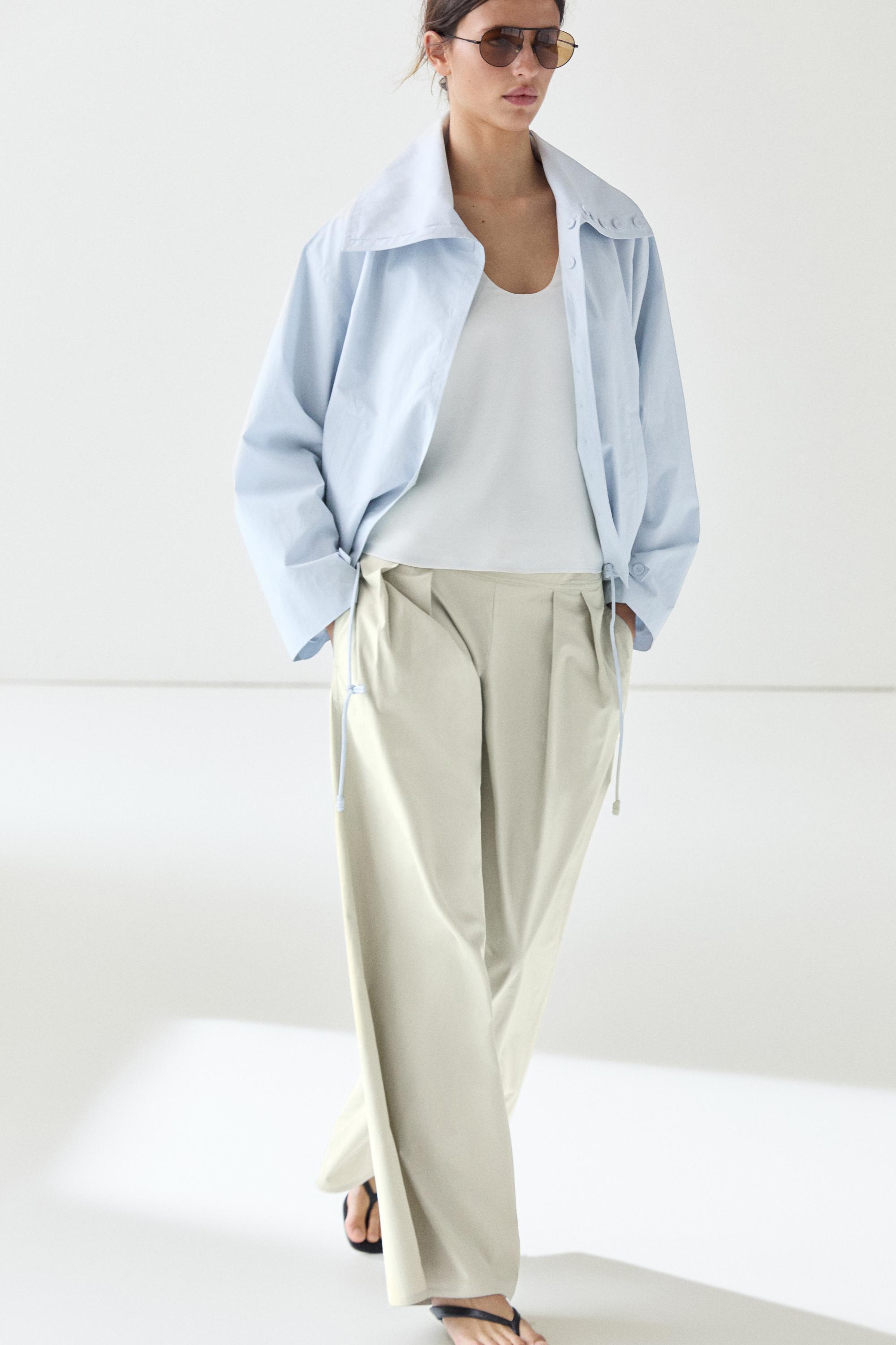 Wide-leg pants with pleated sash detail