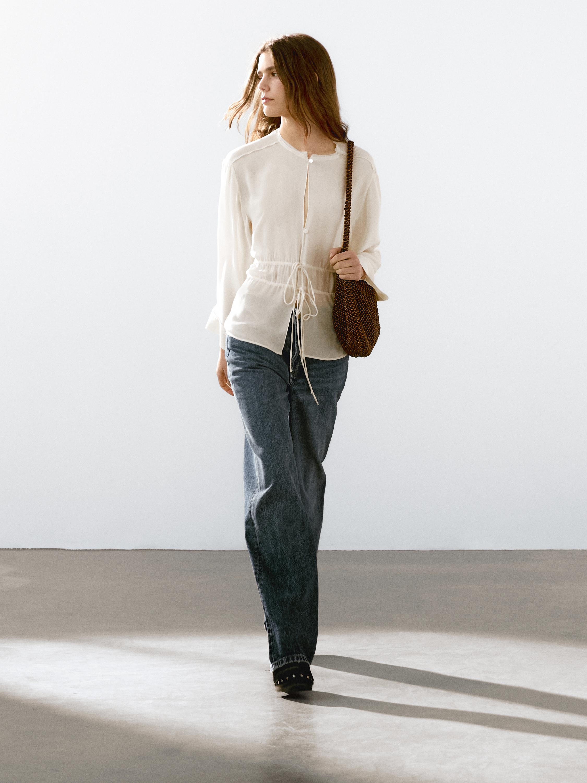 Flowing semi-sheer blouse with ties