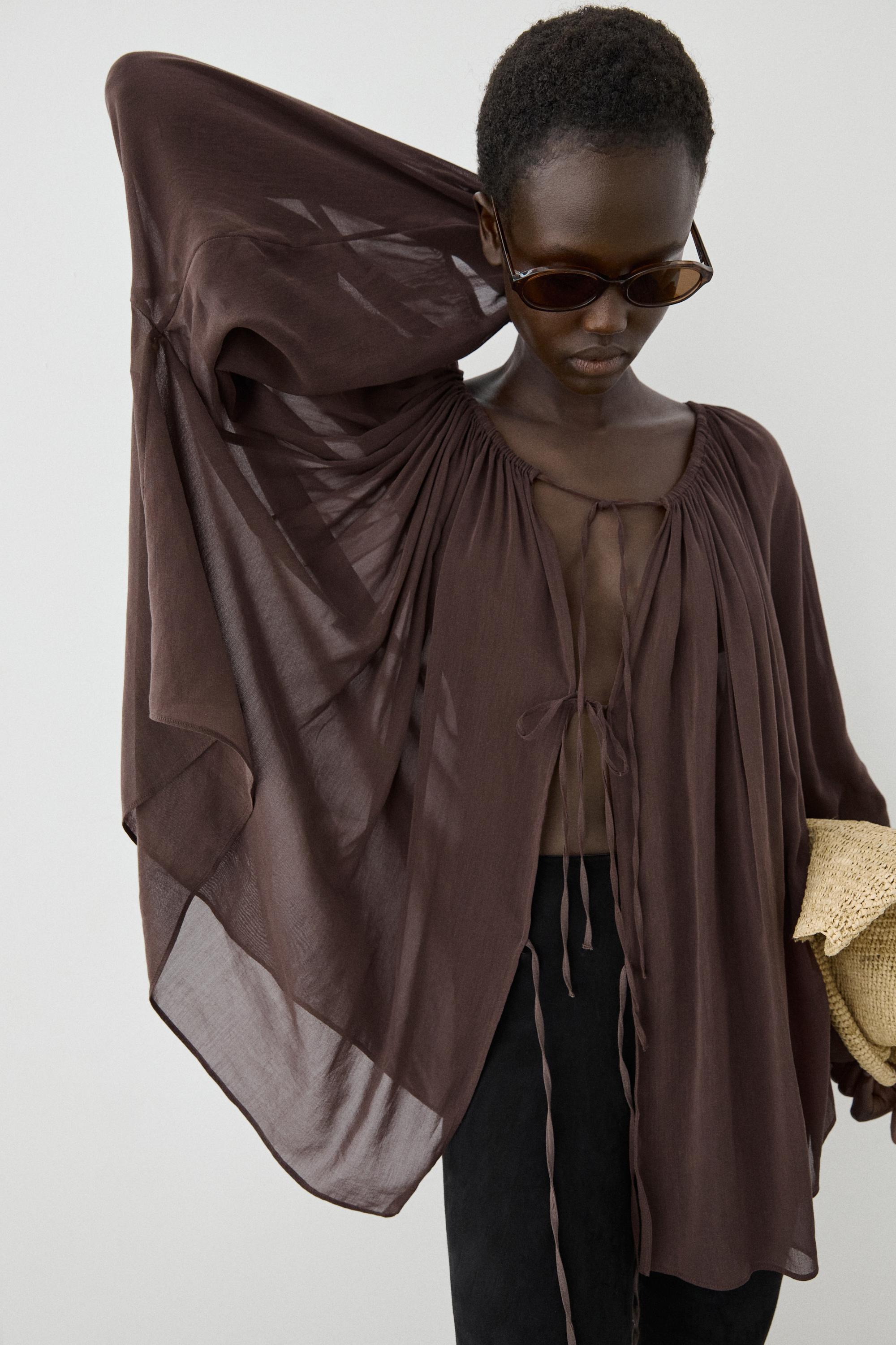 Flowing shirt with gathered details