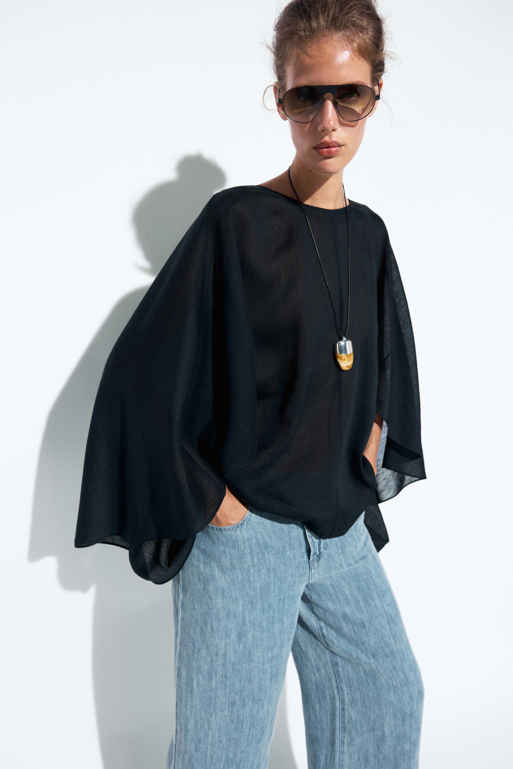 Asymmetric flowing cape