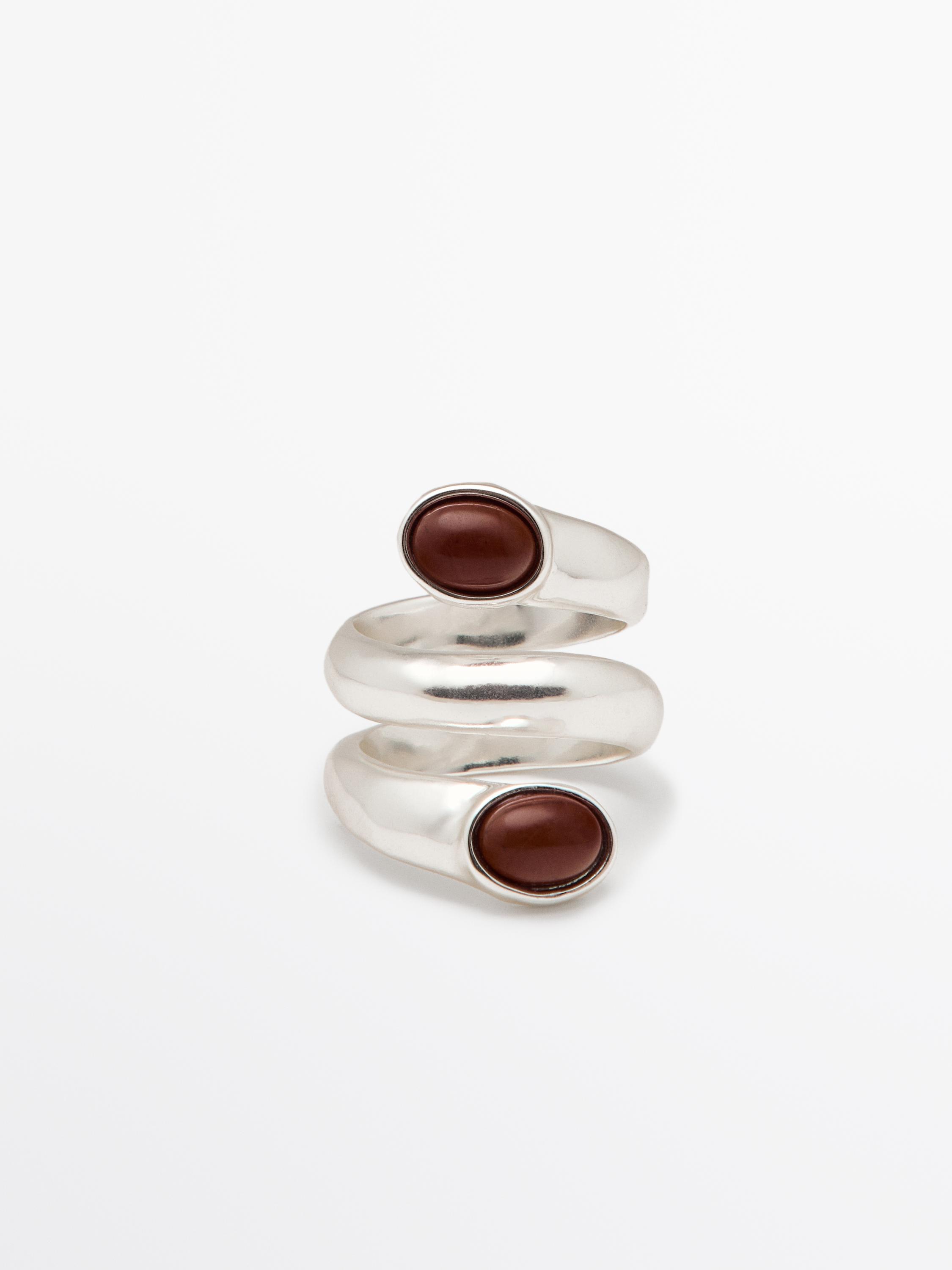 Spiral ring with encrusted details