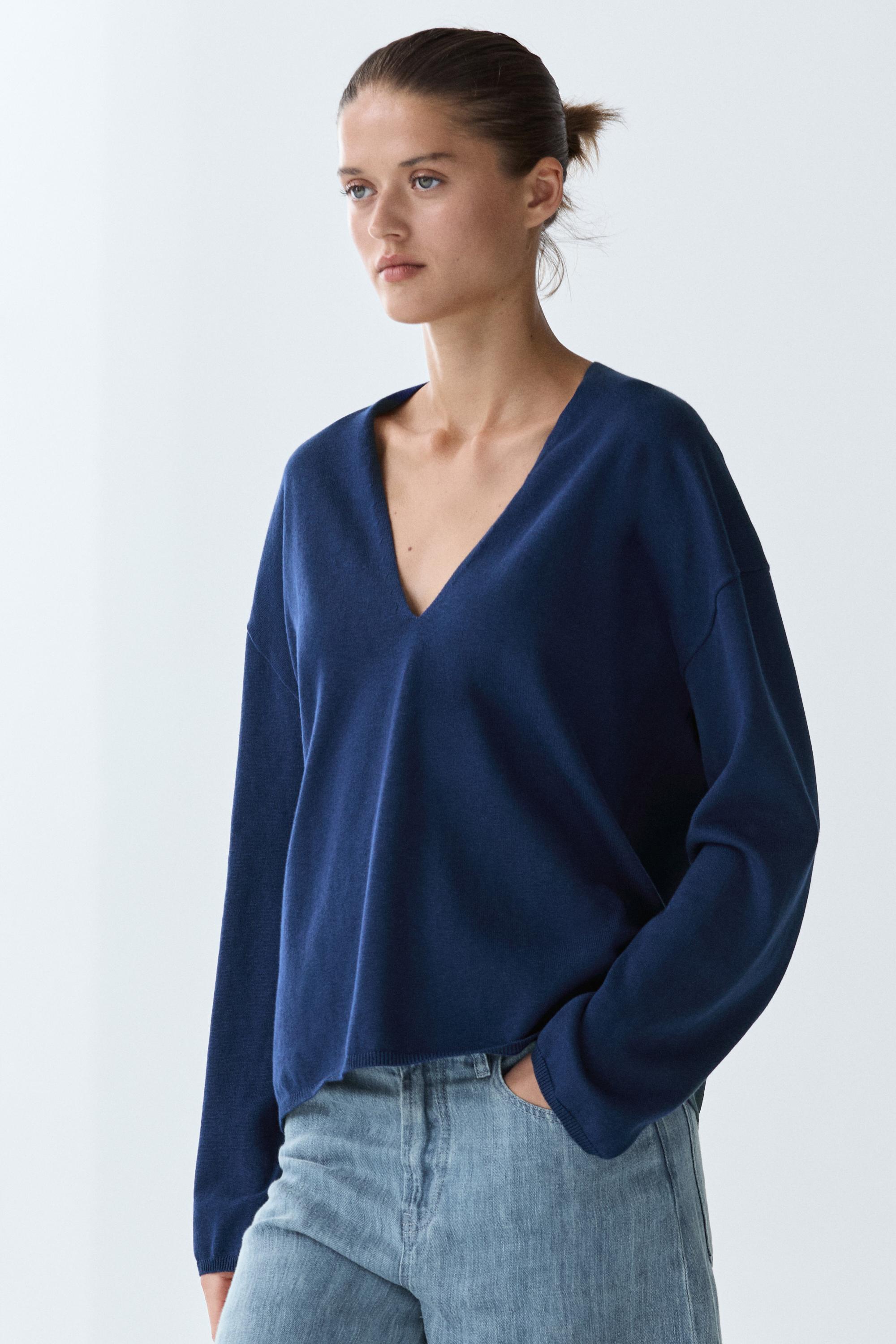 Striped V-neck knit sweater
