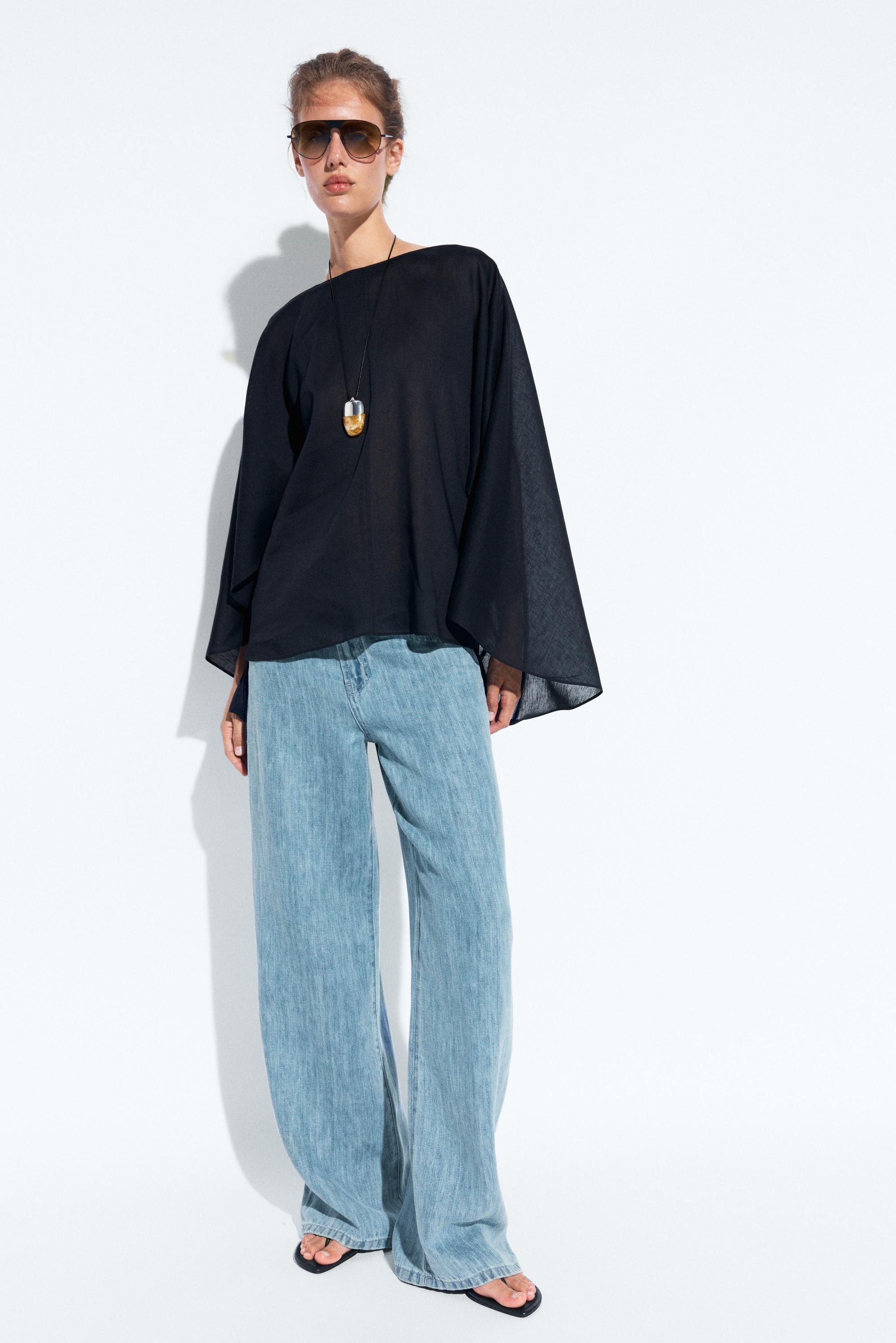 Asymmetric flowing cape