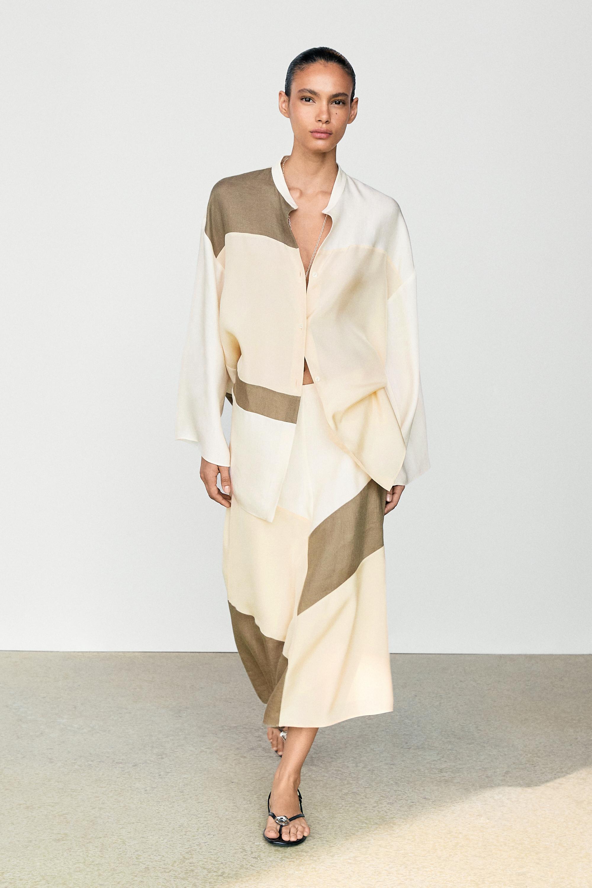 Flowing stand collar shirt with contrast details
