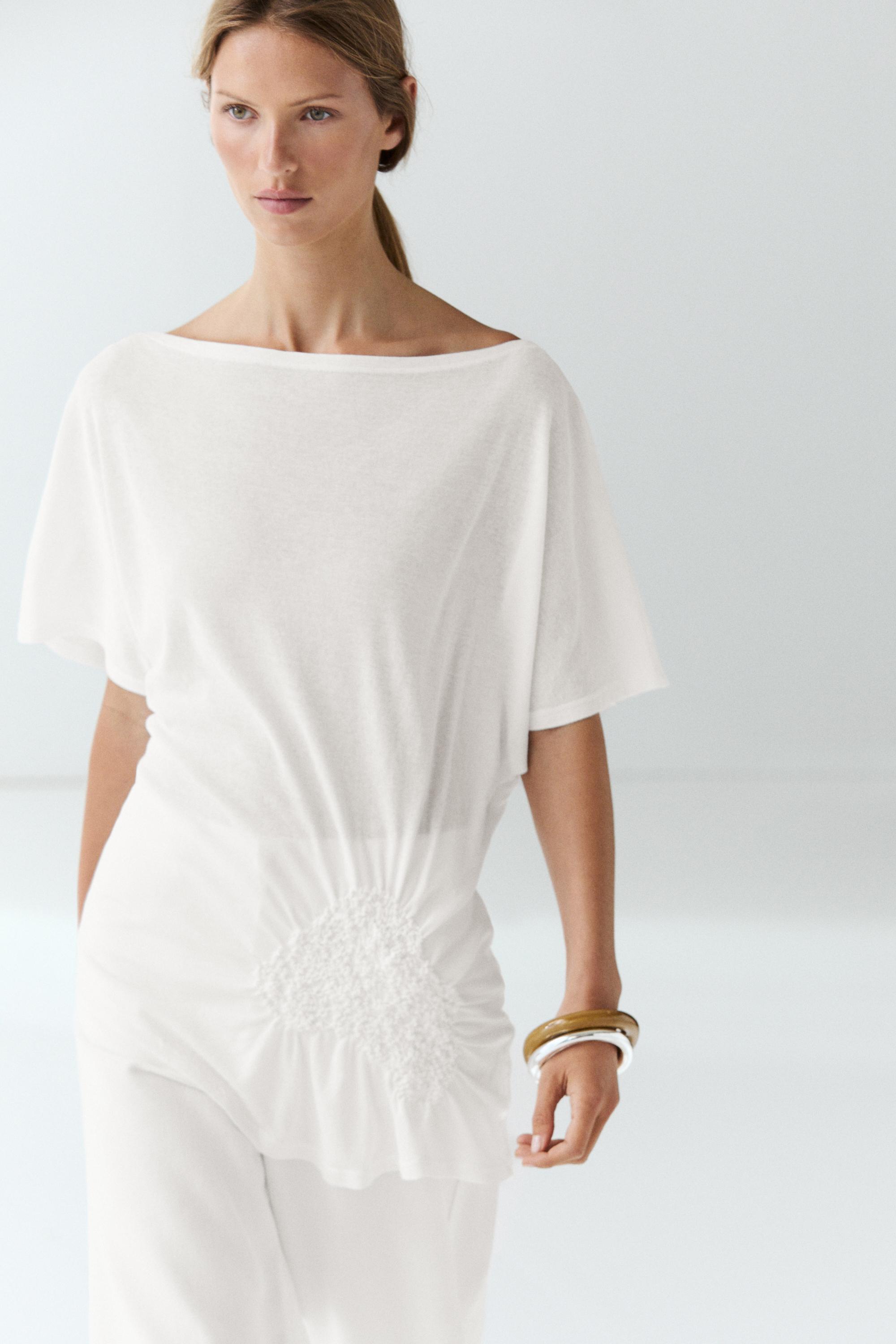 Asymmetric top with embroidered detail