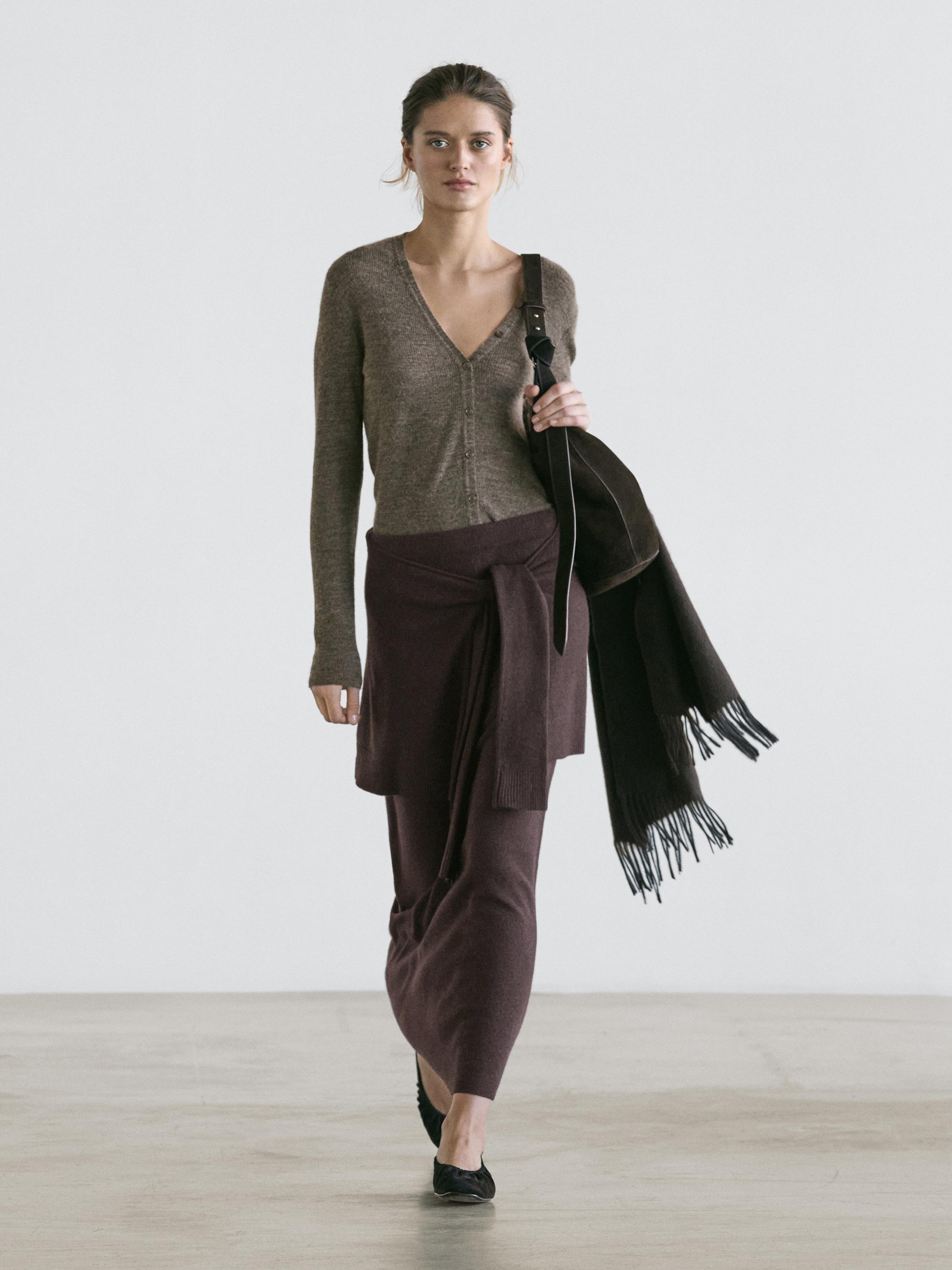 Knit skirt with knotted sleeve details