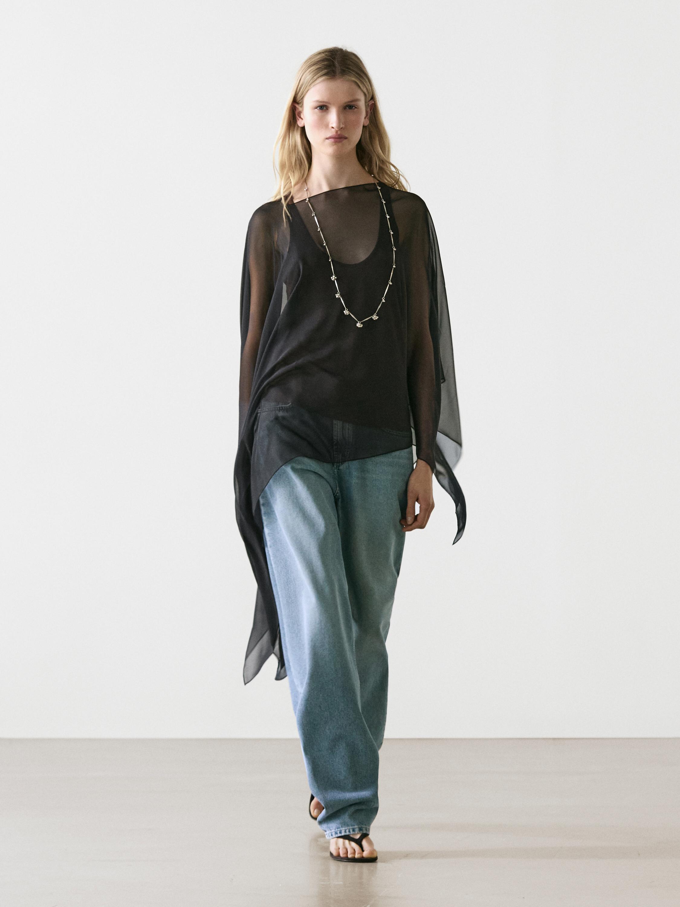 Asymmetric cut silk cape